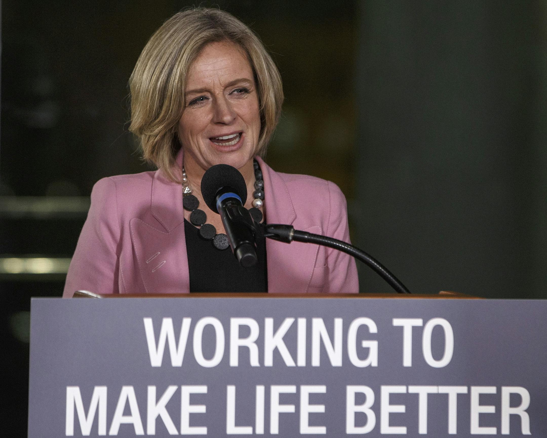 Alberta Premier Rachel Notley speaks during an announcement of a mandatory cut in oil production to deal with a price crisis that is costing Canada an estimated $80 million a day, in Edmonton on Sunday, Dec. 2, 2018. (Jason Franson/The Canadian Press via AP) ORG XMIT: EDM103