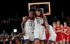 United States’s Sylvia Fowles (13) celebrates he fourth career Olympic gold medal.