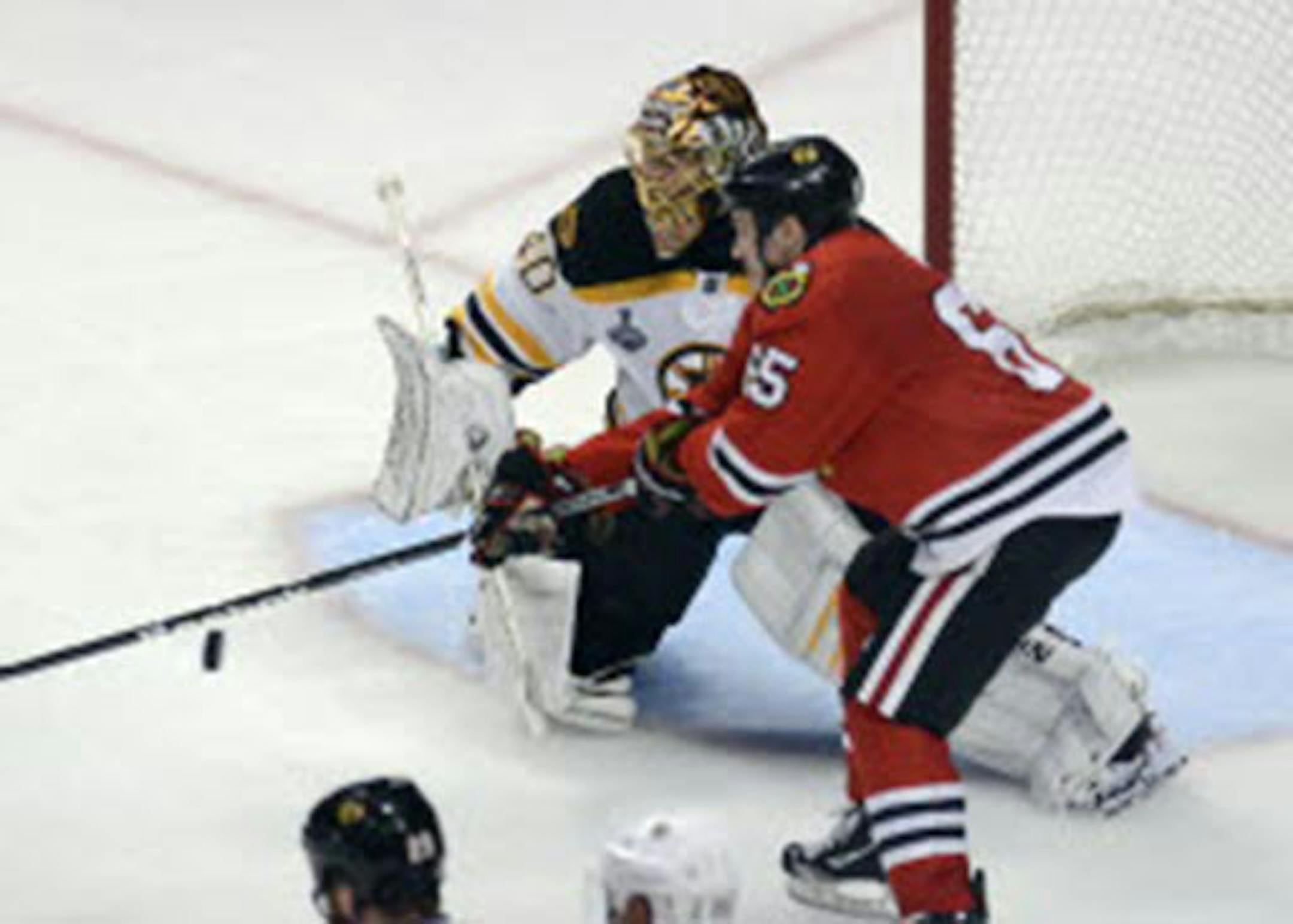 Blackhawks center Andrew Shaw deflected a shot past Bruins goalie Tuukka Rask for the game-winner in the third overtime during Game 1 in the Stanley Cup Final on Wednesday.