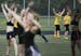 As members of the Blaze Blazettes dance team warm up on the field, youth football players begin to arrive for the Burnsville Football's fourth annual 