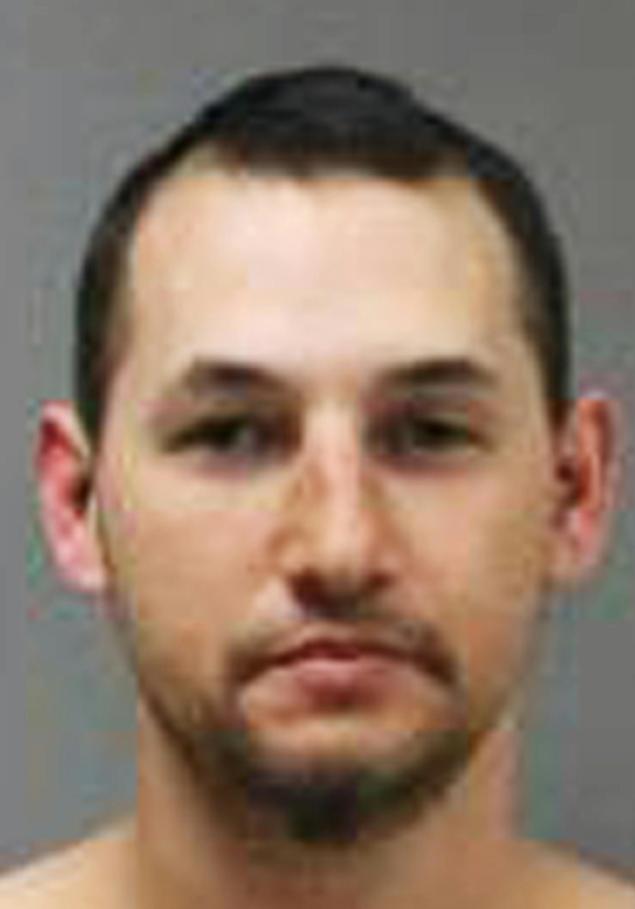 FILE - This file photo provided by the Chippewa County, Minn., Sheriff shows Buford Rogers who was arrested Friday, May 3, 2013, during a raid on a mobile home in Montevideo, Minn. Rogers, 25, is scheduled to be sentenced Monday, April 28, 2014 after pleading guilty to one count of possessing a firearm illegally and one count of possessing an unregistered destructive device, namely "two black powder and nail devices," which he admitted he made himself. Prosecutors are seeking more than five year