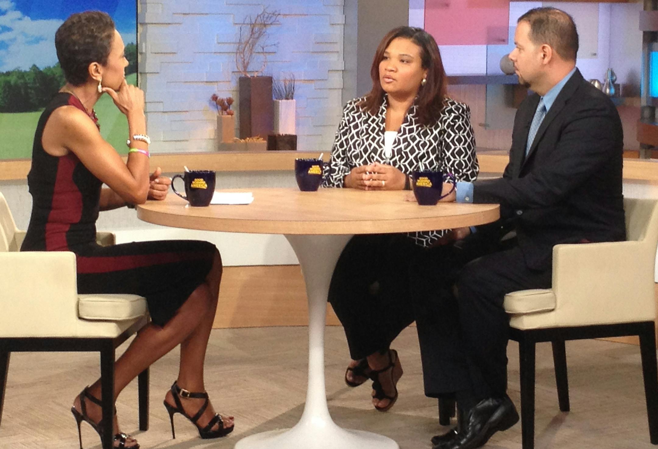 This image released by ABC shows host Robin Roberts, left, with Juror B29 from the George Zimmerman trial, center, and attorney David Chico on "Good Morning America," in New York on Thursday, July 25, 2013. Portions of Roberts' interview with the only minority juror from the Zimmerman trial, will air on "World News Tonight with Diane Sawyer," and "Nightline" on Thursday and the full interview will air on "Good Morning America," on Friday. (AP Photo/ABC, Donna Svennevik)