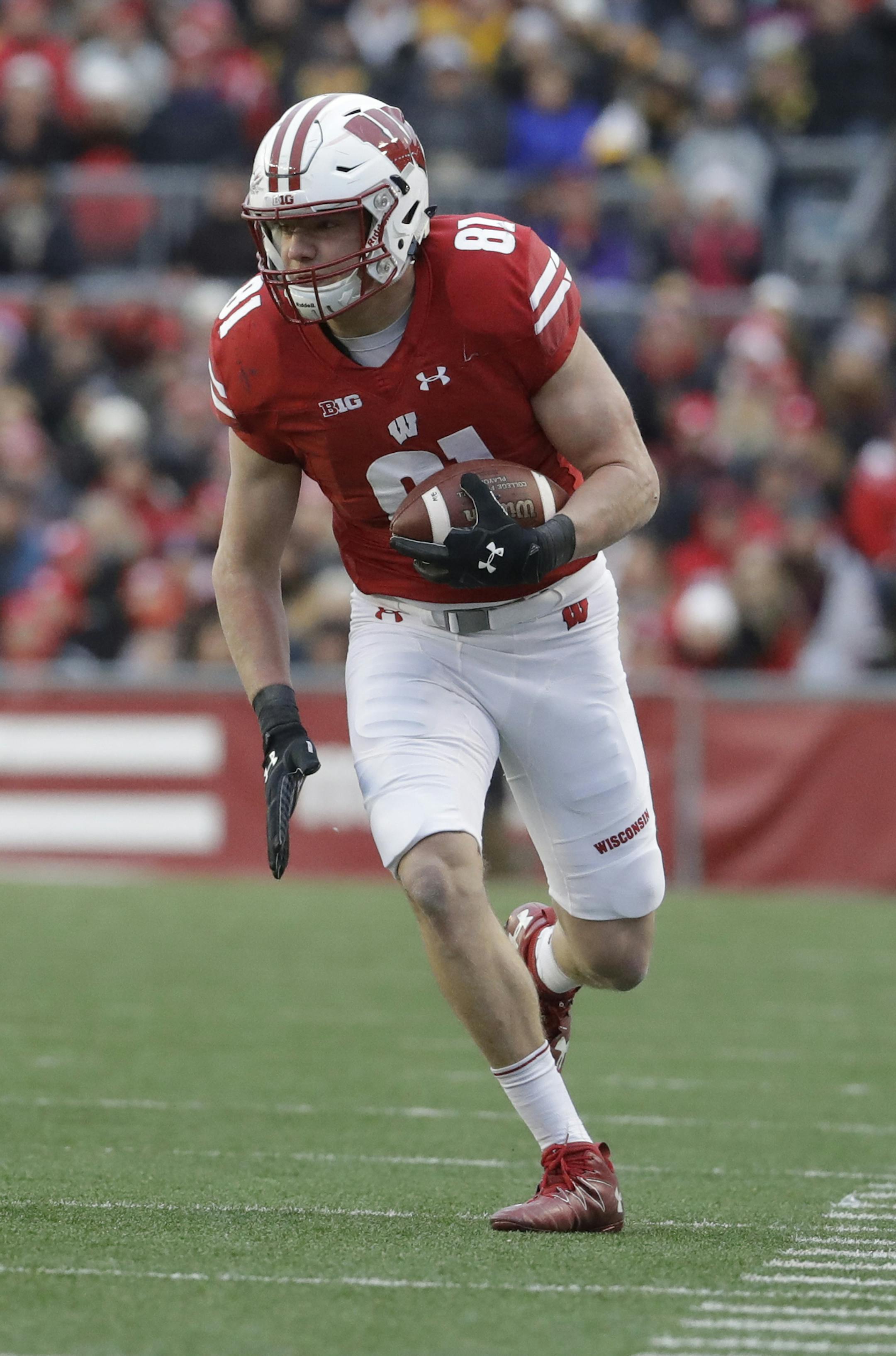 Wisconsin's Troy Fumagalli runs after a catch during the first half of an NCAA college football game against Iowa Saturday, Nov. 11, 2017, in Madison, Wis. (AP Photo/Morry Gash) ORG XMIT: WIMG1