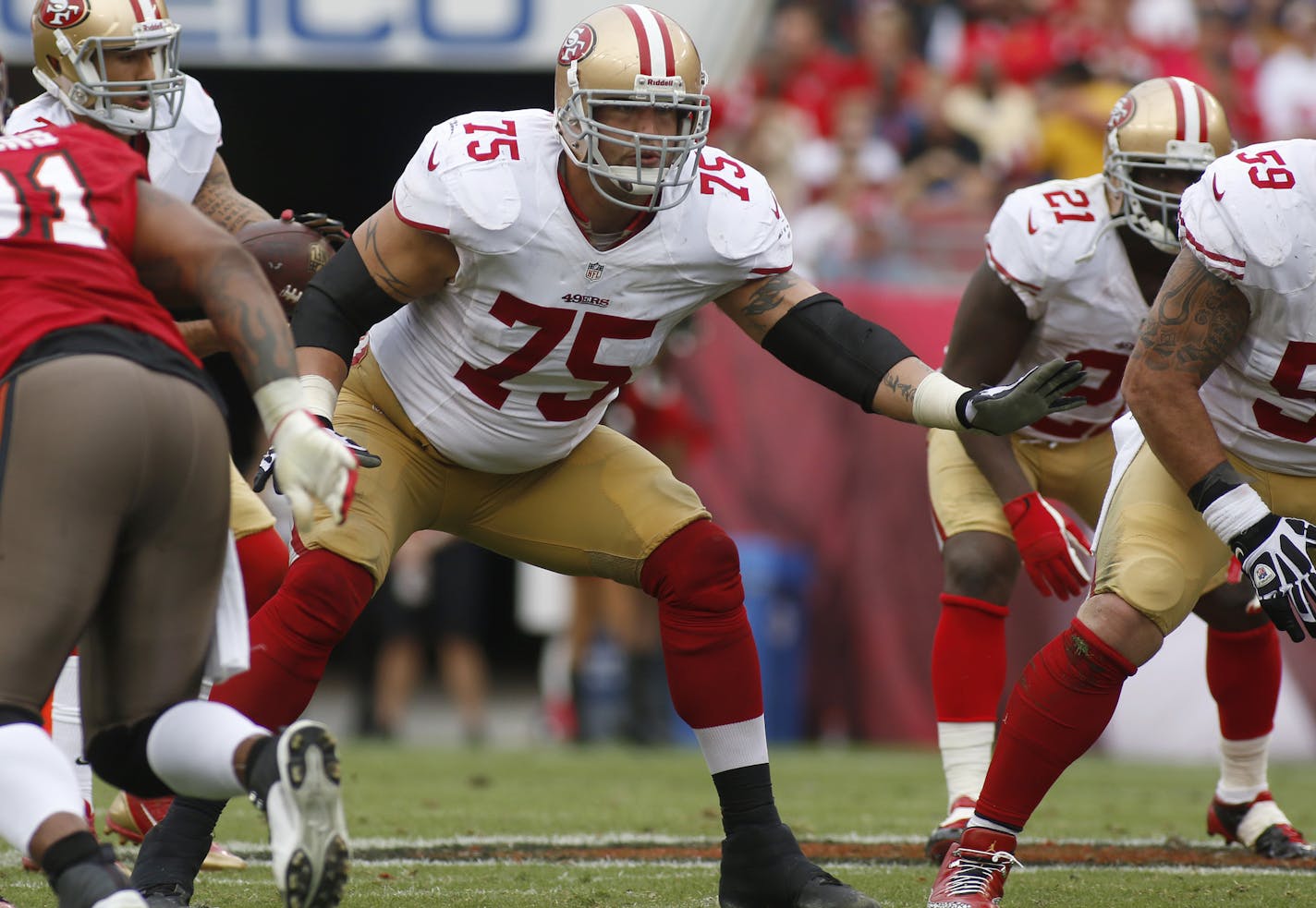 San Francisco 49ers guard Alex Boone (75) blocks during the second half of an NFL football game against the Tampa Bay Buccaneers on Sunday, Dec. 15, 2013, in Tampa, Fla. The 49ers won 33-14. (AP Photo/Reinhold Matay) ORG XMIT: FLRM186