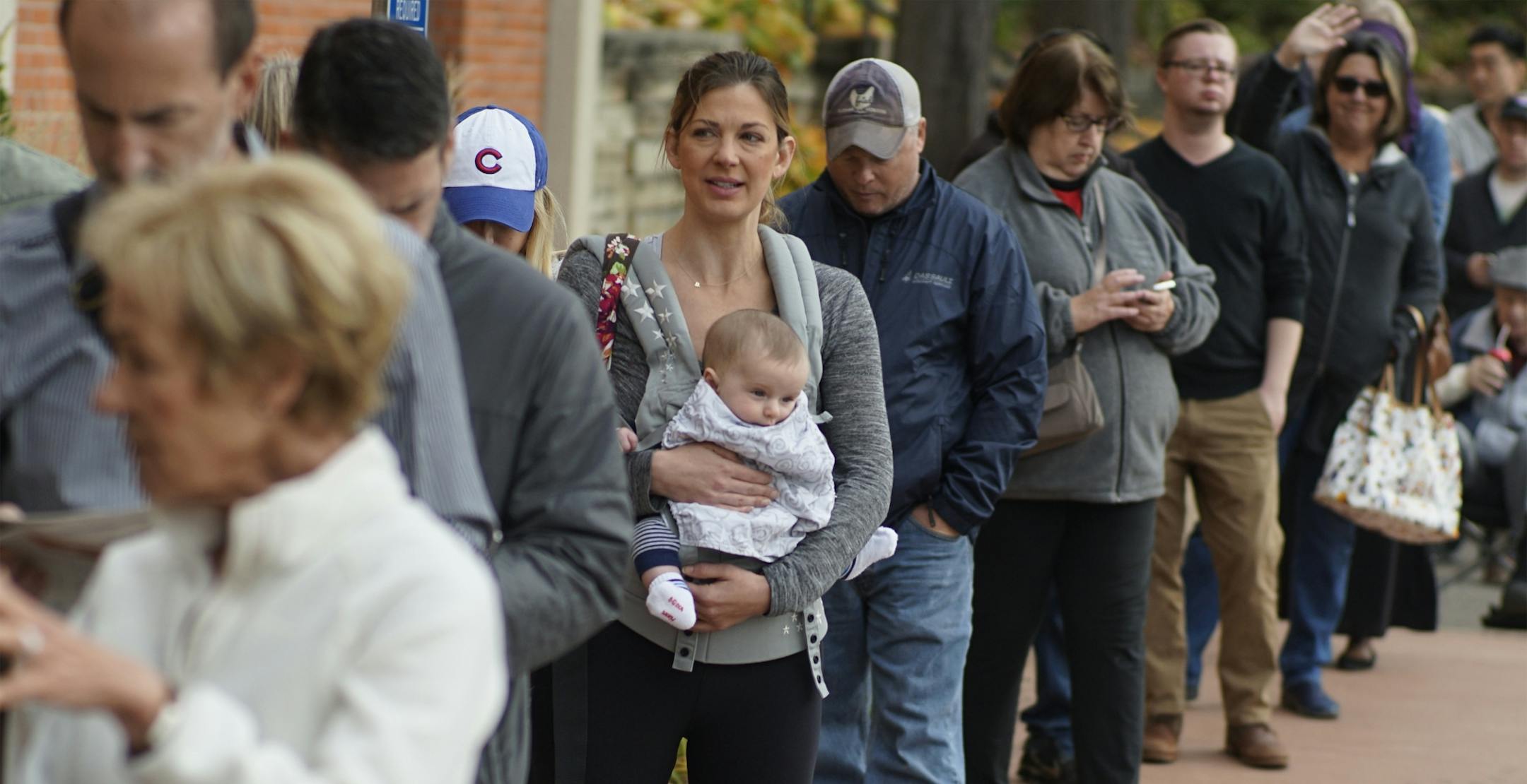 Amy O'Donell waited in line with her 4-month old, Ben. She though the line would be shorter today.