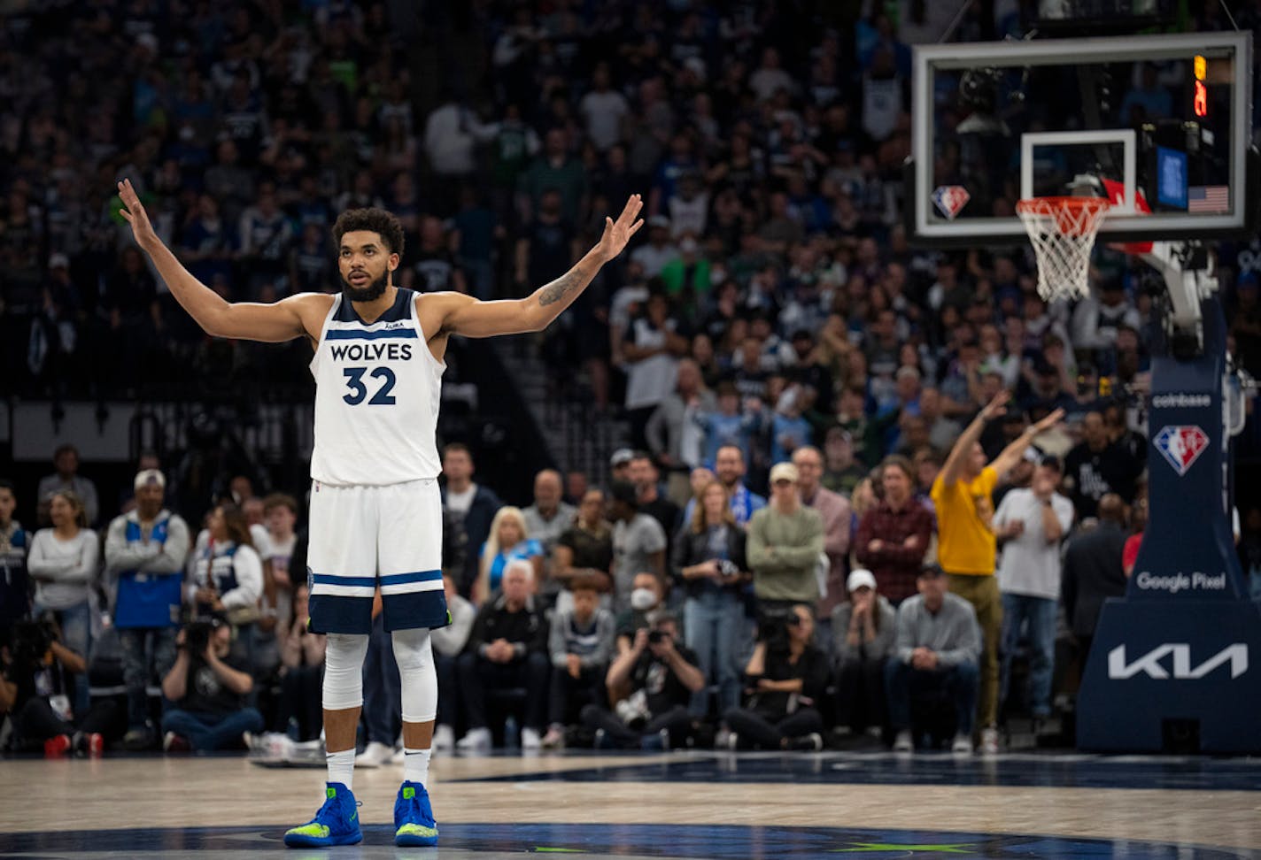 Minnesota Timberwolves center Karl-Anthony Towns (32) signaled the crowd to quiet down for a teammate to shoot free throws late in the fourth quarter Saturday night, April 23, 2022 at Target Center in Minneapolis. The Minnesota Timberwolves defeated the Memphis Grizzlies 119-118 in game 4 of their NBA first round playoff series.   ]   JEFF WHEELER • Jeff.Wheeler@startribune.com