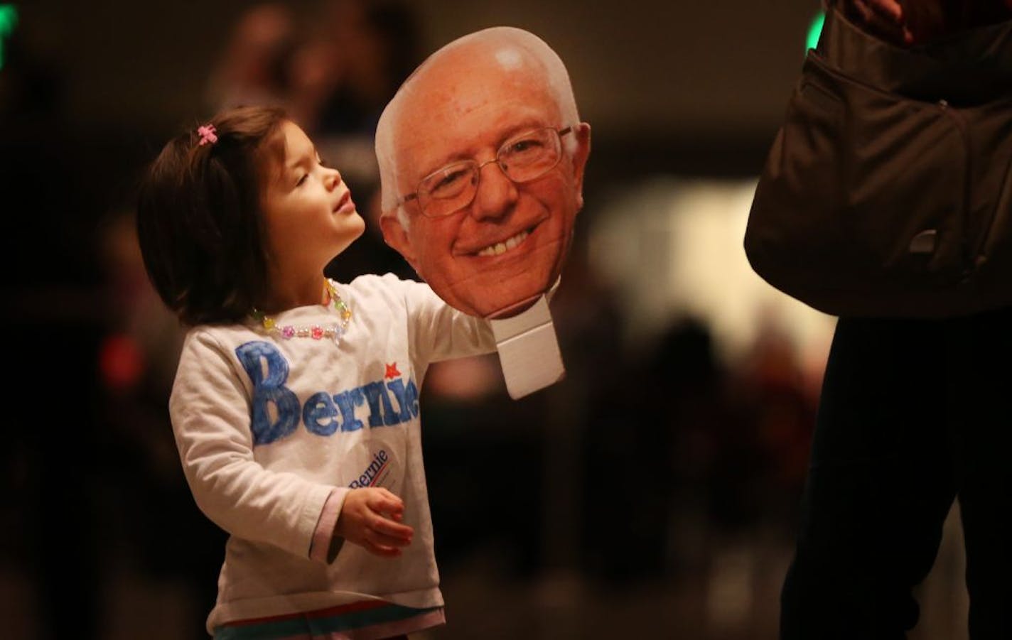 Emma Belalcazar, 3, waited with her parents to see Democratic presidential candidate Bernie Sanders speak at the Minneapolis Convention Center on Monday.