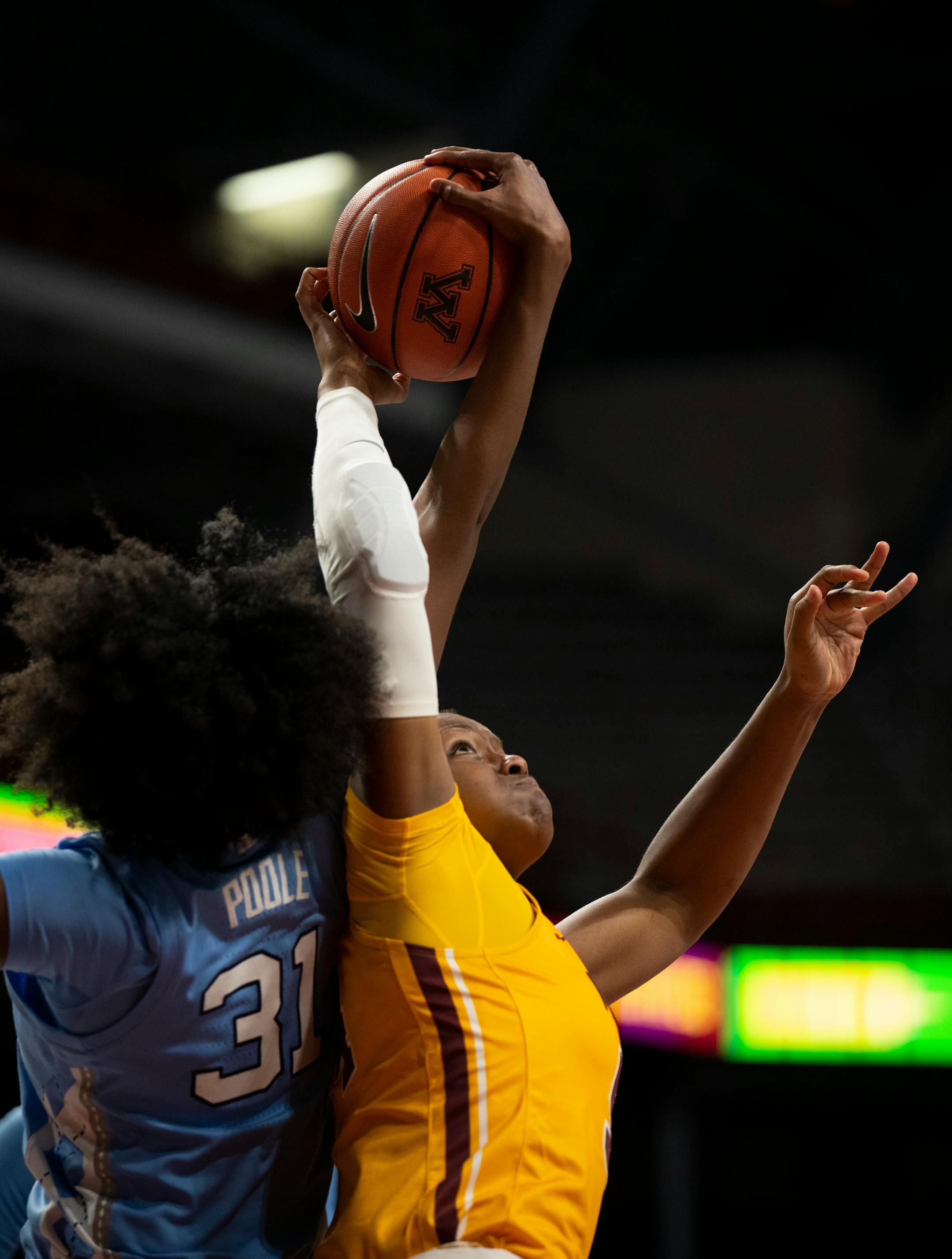 Minnesota Gophers forward Alanna Micheaux (54) and North Carolina Tar Heels forward Anya Poole (31) battled for a rebound in the first quarter Wednesday, Dec. 1, 2021 at Williams Arena in Minneapolis. The University of Minnesota women's basketball team faced the University of North Carolina in an NCAA basketball game Wednesday, Dec. 1, 2021 night at Williams Arena in Minneapolis. ] JEFF WHEELER • Jeff.Wheeler@startribune.com