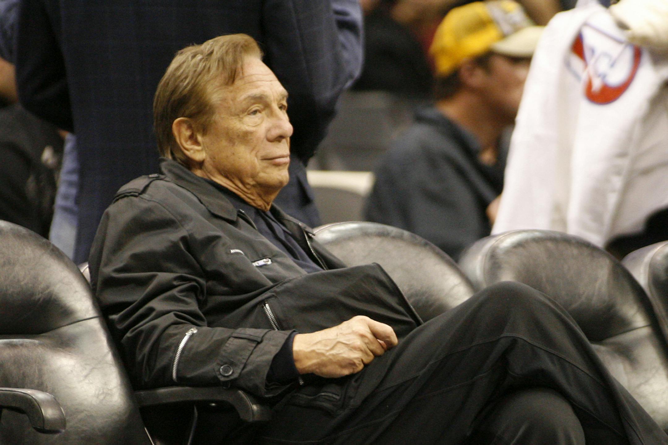 Los Angeles Clippers owner Donald Sterling sits courtside at the NBA basketball game between the New York Knicks and the Los Angeles Clippers in Los Angeles on Sunday, April 4, 2010. On Saturday, April 26, 2014, the NBA said it is investigating a report of an audio recording in which a man purported to be Sterling makes racist remarks while speaking to his girlfriend. (AP Photo/Danny Moloshok)