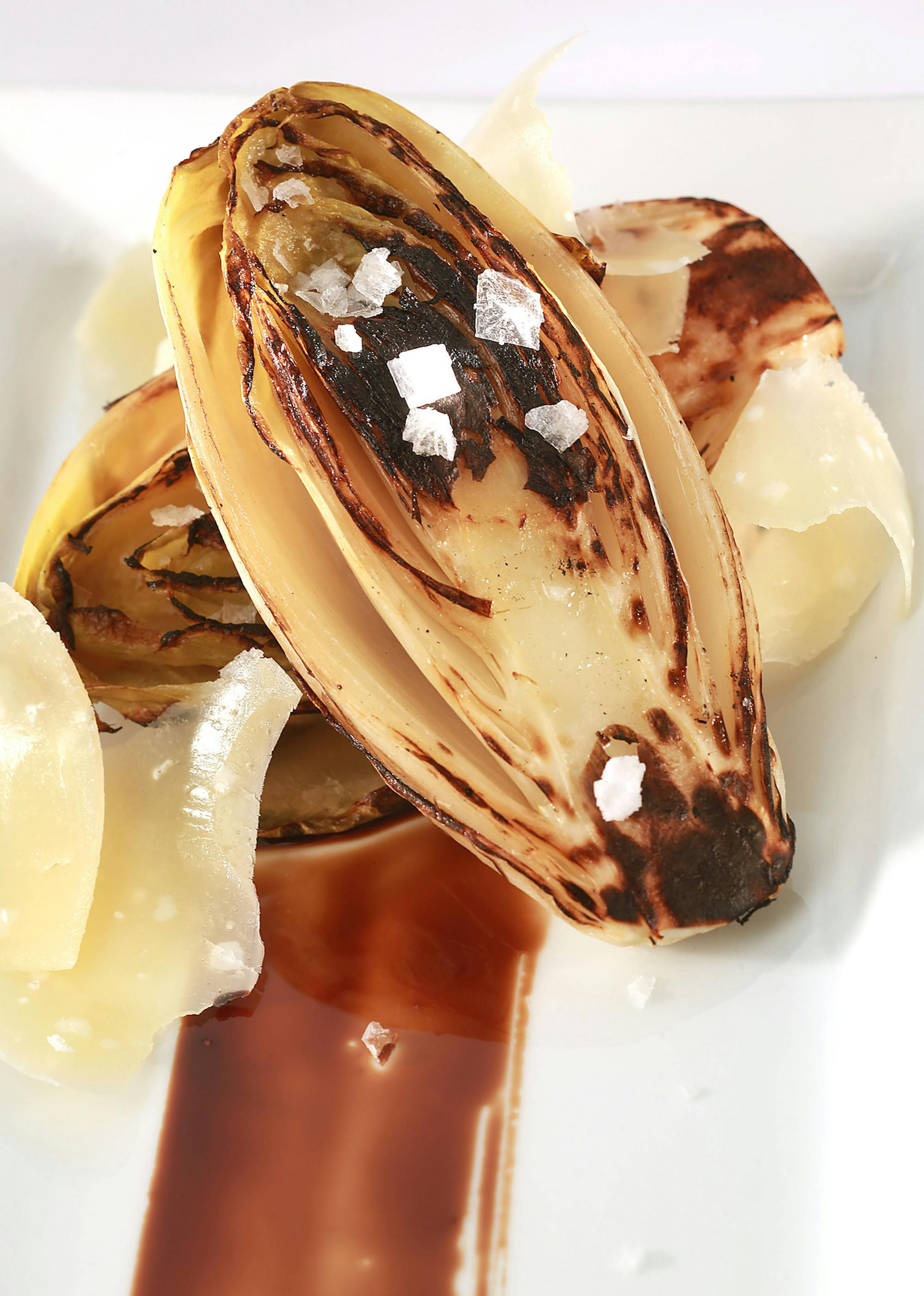 Charred Endive with Balsamic vinegar and Parmesan. (Kirk McKoy /Los Angeles Times/TNS) ORG XMIT: 1181215