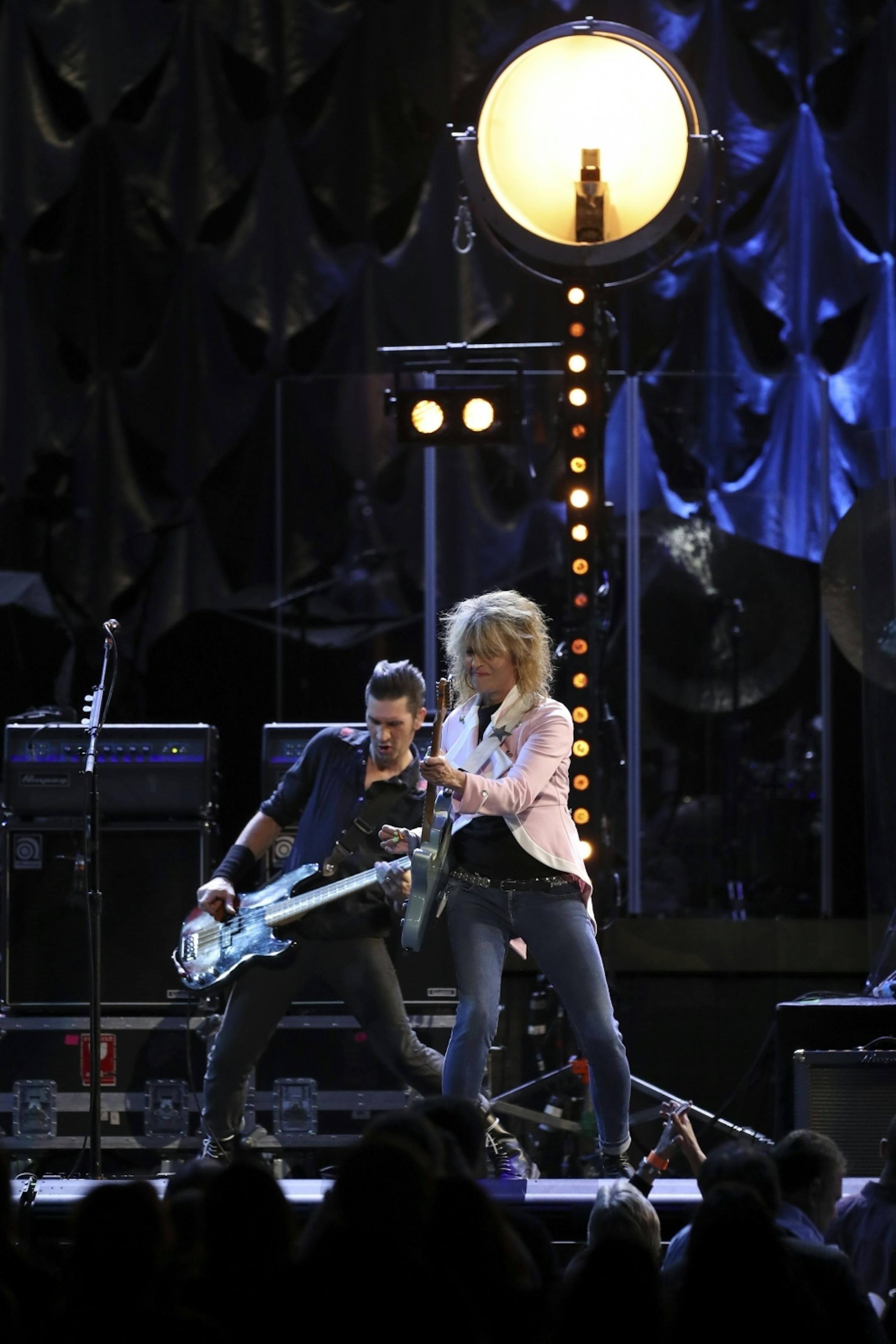 Chrissie Hynde with bassist Nick Wilkinson during the Pretenders set Tuesday night at Xcel Energy Center.