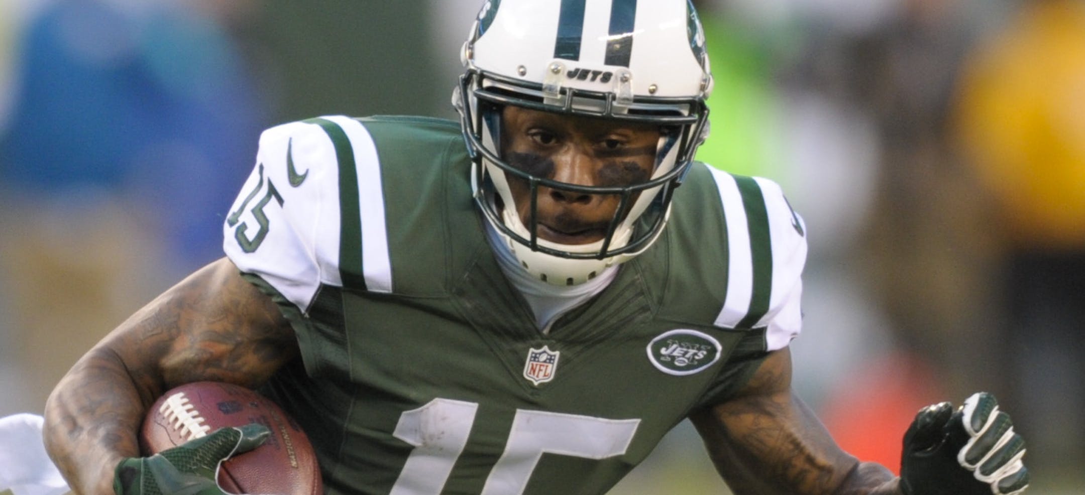 New York Jets wide receiver Brandon Marshall (15) breaks away from Miami Dolphins' Brent Grimes (21) during the second half of an NFL football game Sunday, Nov. 29, 2015, in East Rutherford, N.J. (AP Photo/Bill Kostroun)