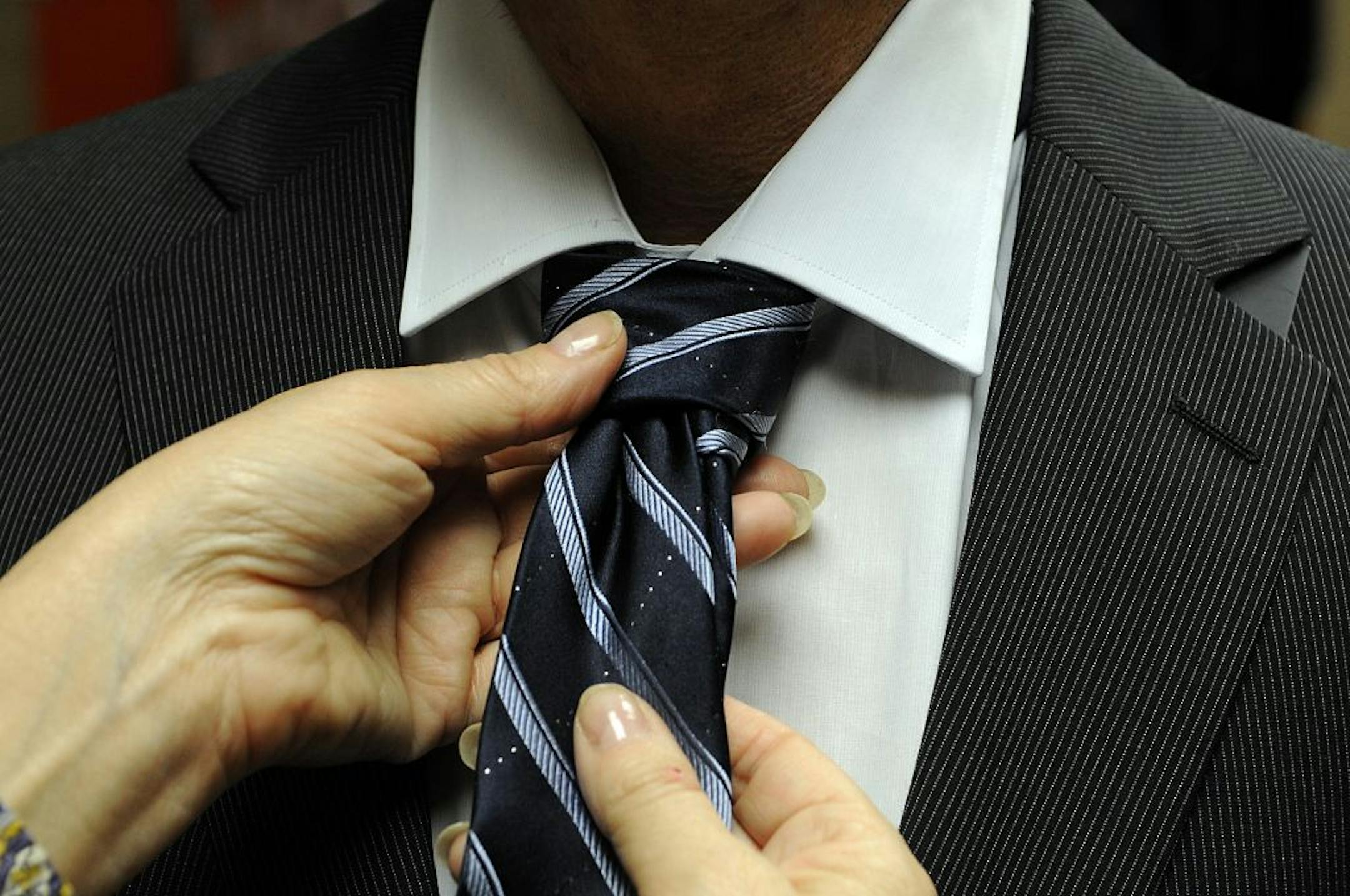 Minneapolis, Mn. Tuesday 4/6/10 Linda Froiland, image consultant helps business people look their best. She has honed her fashion sense from 20 years of theater work in the Twin Cities and in TV, movie and commercial production in Hollywood. Linda Froiland met with a client at Elsworth Menswear in Minneapolis where she picked out a suit, shirt and tie.