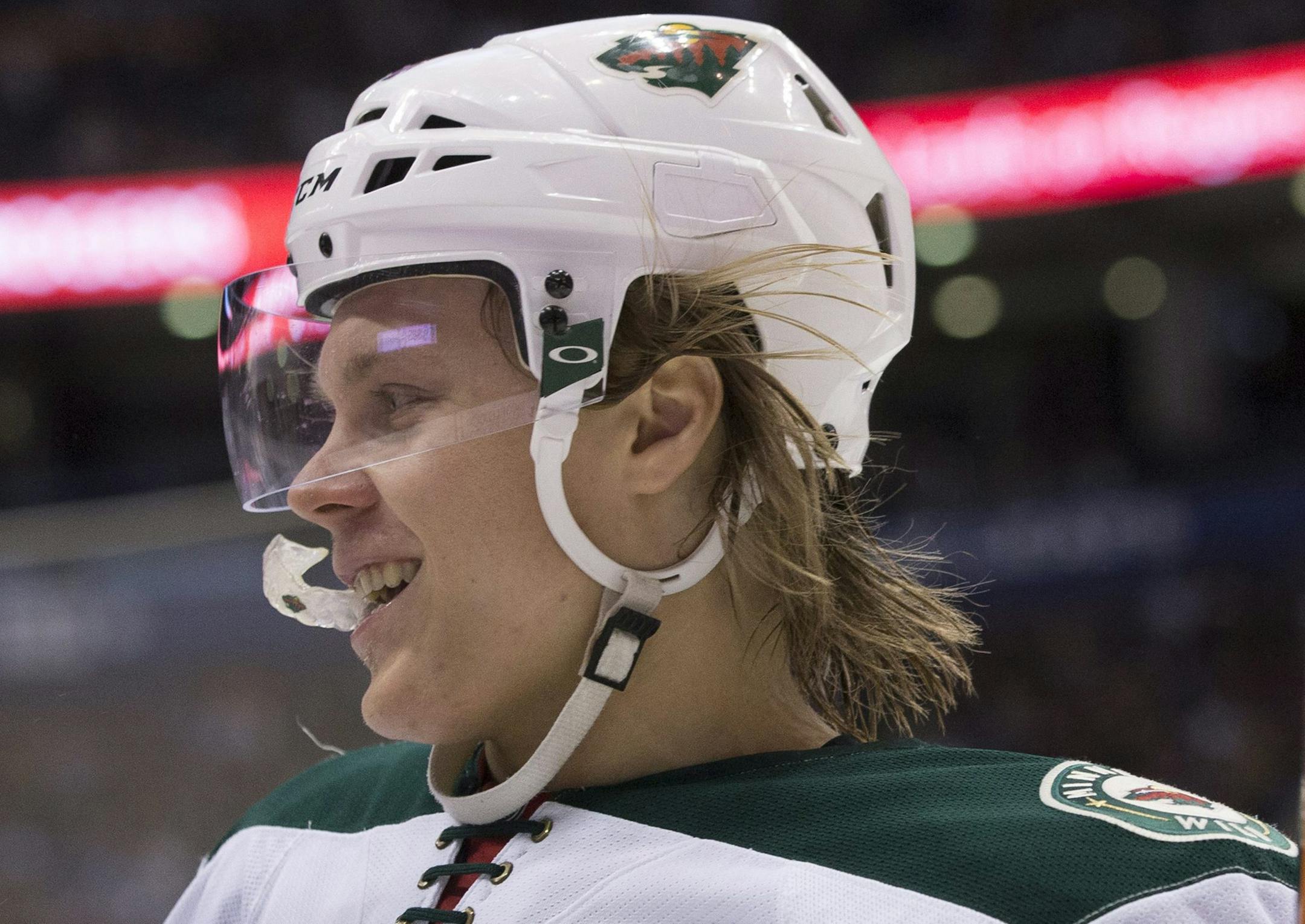 Minnesota Wild's Mikael Granlund celebrates after scoring against the Toronto Maple Leafs during third-period NHL hockey game action in Toronto, Thursday, March 3, 2016. (Chris Young/The Canadian Press via AP) MANDATORY CREDIT