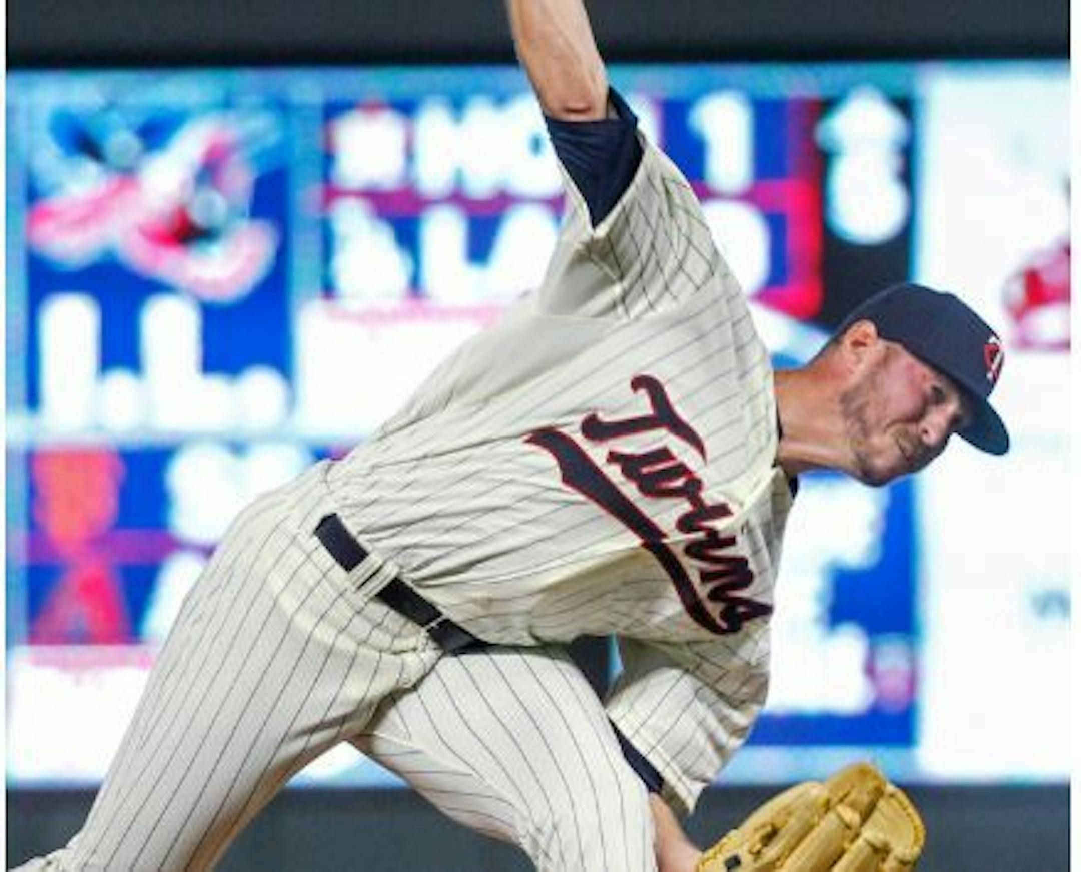 Minnesota Twins relief pitcher Oliver Drake throws to a Kansas City Royals batter during the ninth inning of a baseball game Saturday, Aug. 4, 2018, in Minneapolis. The Twins won 8-2. Drake pitched for his fifth team this season.