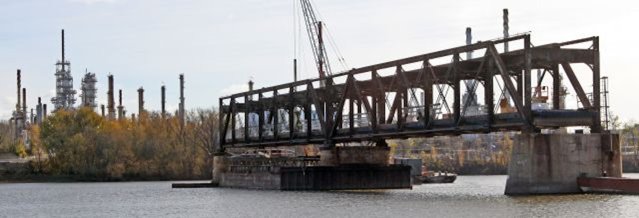 (left to right) Crews restored the old Rock Island Swing Bridge near the River Heights Marina in Inver Grove Heights. The marina says a riprap dam used to transport materials from the shore to the bridge has restriced the water flow of the Misissippi River causing silt build up, causing water level problems.