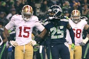 Seattle Seahawks cornerback Richard Sherman rubs in the defeat after knocking away a pass from San Francisco wide receiver Michael Crabtree (15) in th