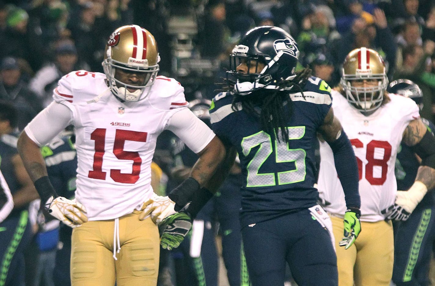 Seattle Seahawks cornerback Richard Sherman rubs in the defeat after knocking away a pass from San Francisco wide receiver Michael Crabtree (15) in the NFC championship game at CenturyLink Field in Seattle on Sunday, Jan. 19, 2014. The Seattle Seahawks defeated the San Francisco 49ers, 23-17. (Tony Overman/The Olympian/MCT) ORG XMIT: 1148053 ORG XMIT: MIN1401192216420083