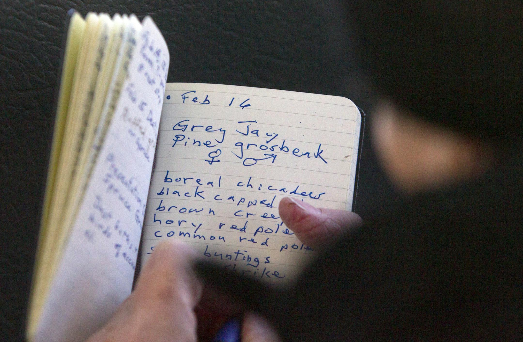 Retired Episcopal priest Ed Newbury, 74, of Kimball, NE, kept a log of birds seen in the Sax-Zim Bog during the Sax-Zim Winter Birding Festival Saturday, Feb. 16, 2013, in Meadowlands, MN.] (DAVID JOLES/STARTRIBUNE) djoles@startribune.com Every mid-February, bird watchers from around the country -- and even a few from overseas -- gather before dawn in a frozen bog in northern Minnesota for the Sax-Zim Winter Birding Festival. Bundled in every piece of warm clothing they own and facing frigid tem