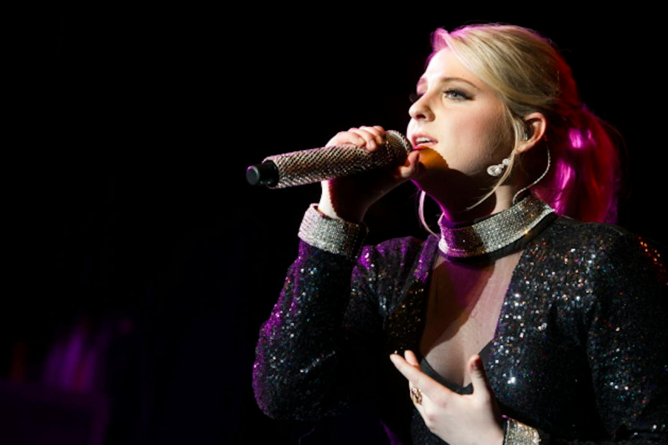 FILE - In this Friday, March 13, 2015, file photo, Meghan Trainor performs in concert at Irving Plaza in New York. Trainor announced on Instagram, Thursday, July 2, 2015, she is postponing two upcoming shows because of a hemorrhage on her vocal chords. (Photo by Charles Sykes/Invision/AP, File)