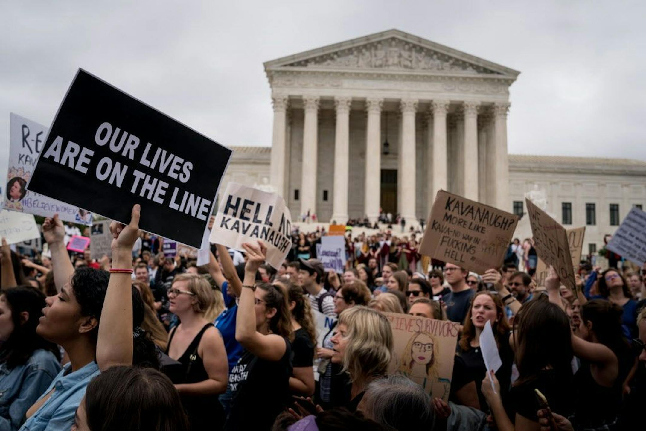 Demonstrators outside the Supreme Court building in Washington, Oct. 6, 2018. A deeply divided Senate was poised on Saturday to confirm Judge Brett Kavanaugh to the Supreme Court, delivering a victory to President Donald Trump on a vote is expected to be almost entirely along party lines.