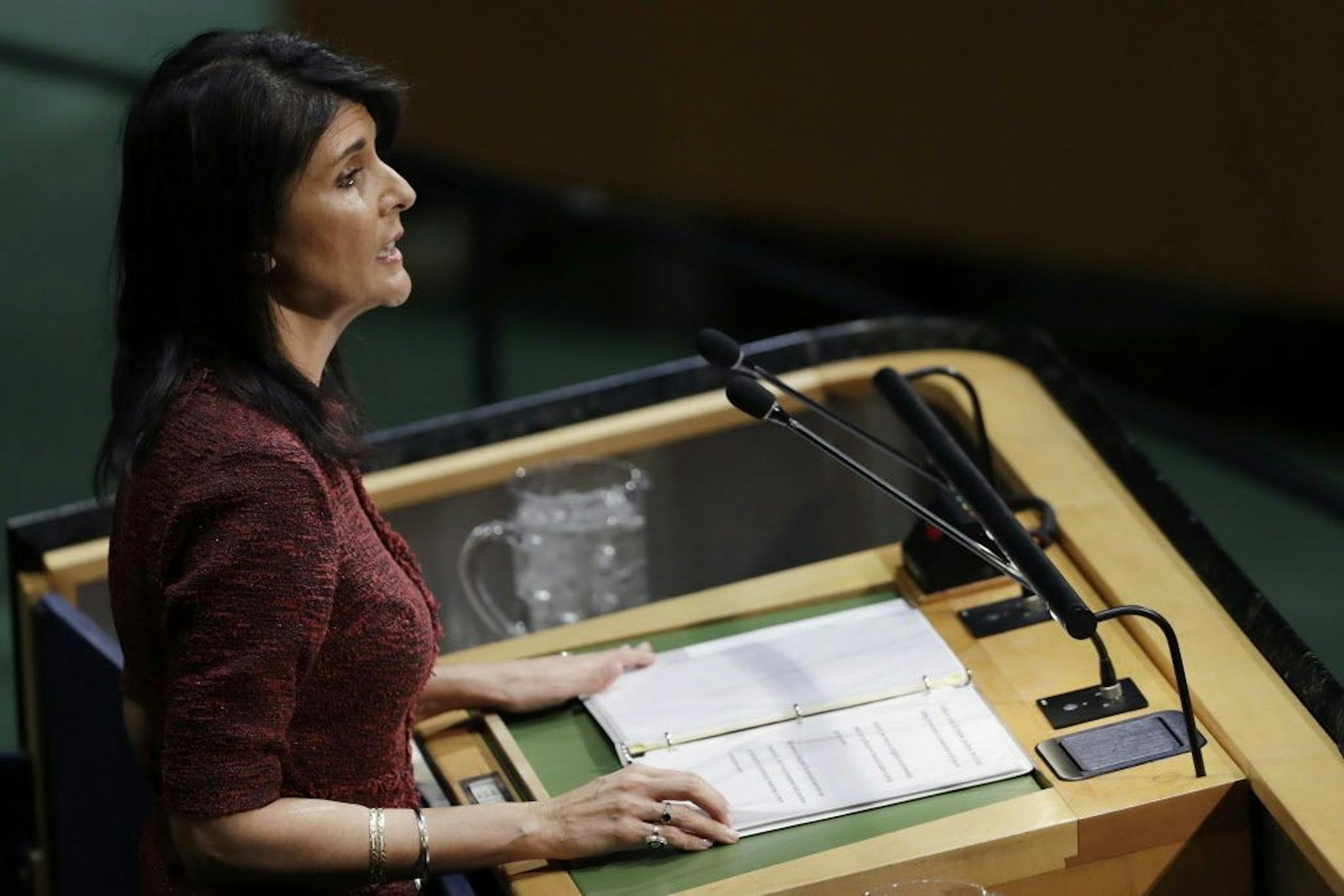 U.S. Ambassador to the United Nations Nikki Haley speaks at the U.N. General Assembly, Thursday, Dec. 21, 2017, at United Nations headquarters. President Donald Trump's threat to cut off U.S. funding to countries that oppose his decision to recognize Jerusalem as Israel's capital has raised the stakes in Thursday's U.N. vote and sparked criticism of his tactics, with one Muslim group calling it bullying or blackmail.