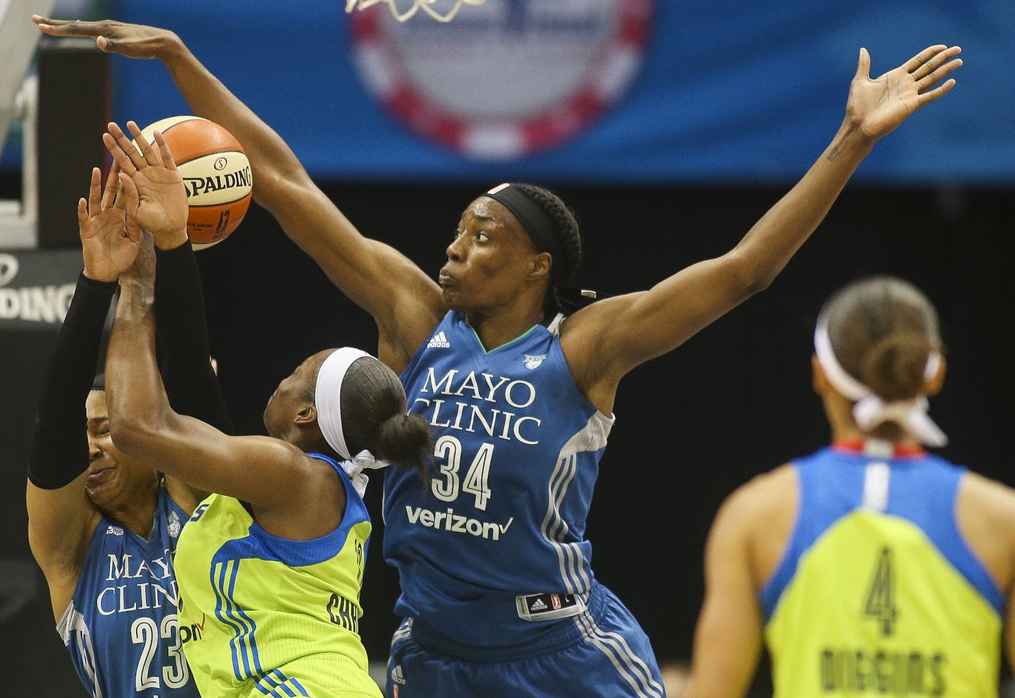 Minnesota Lynx center Sylvia Fowles (34) gets a piece of the ball as Dallas Wings forward Karima Christmas (13) drives to the basket. ] Timothy Nwachukwu &#x2022; timothy.nwachukwu@startribune.com The Minnesota Lynx play the Dallas Wings at the Target Center on Saturday, July 9, 2016.