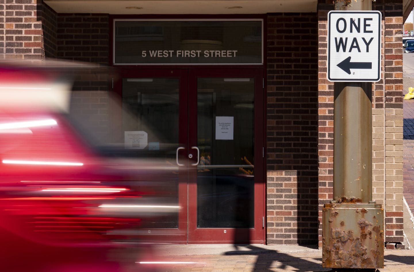 Vehicles move down First St. in Duluth on Wednesday June 24, 2020. ] ALEX KORMANN • alex.kormann@startribune.com First St. in downtown Duluth will be switched to a two-way, a major change in the flow of traffic through the heart of town.