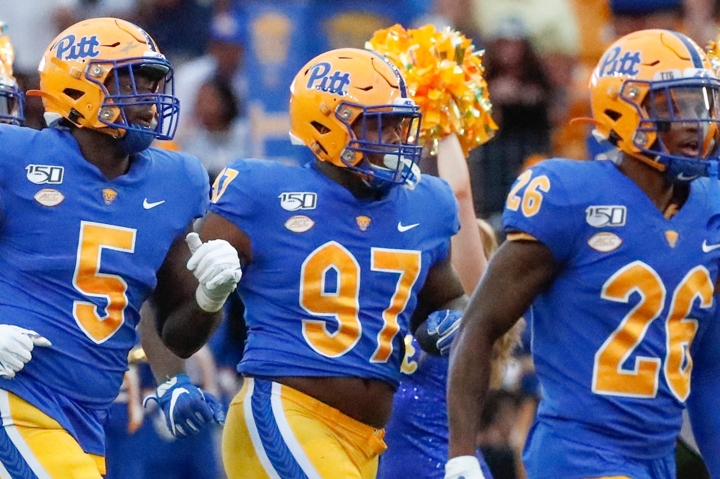 FILE - This Aug. 31, 2019, file photo shows Pittsburgh defensive lineman Jaylen Twyman (97) as he takes the field with his team to play an NCAA football game against Virginia in Pittsburgh. Twyman cried while watching Pitt football go on without him after the defensive lineman opted out of the 2020 season. It was a decision Twyman felt necessary — both financially and emotionally — to prepare him for the 2021 NFL draft. (AP Photo/Keith Srakocic, File)