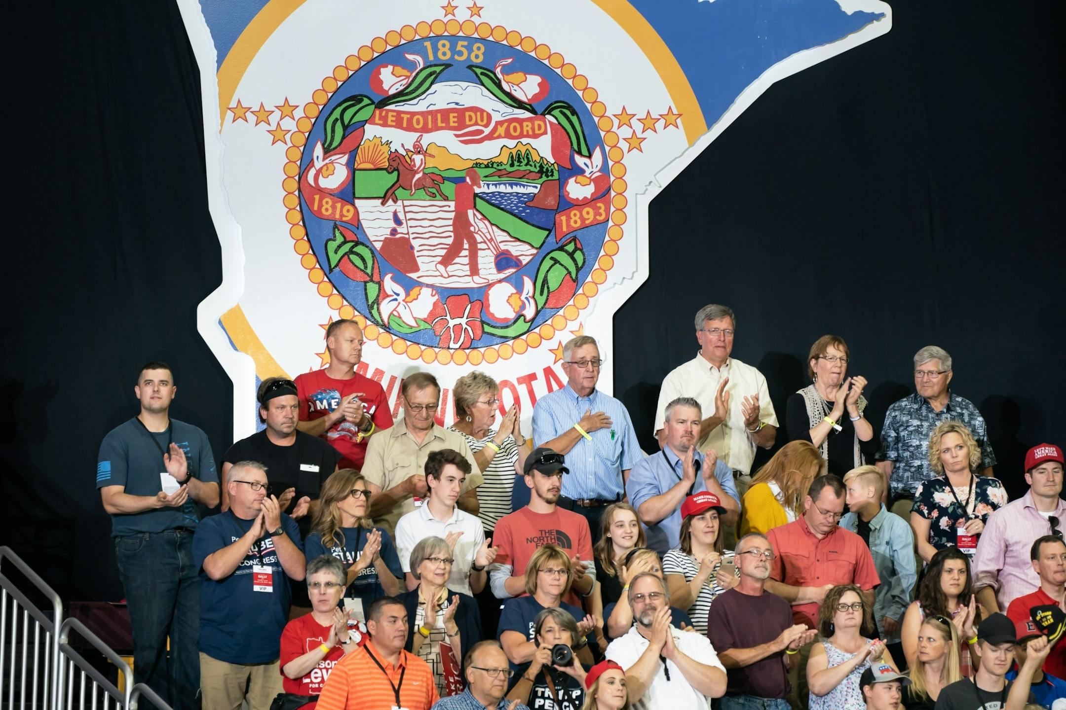 Singing the Star Spangled Banner at the beginning of the rally.