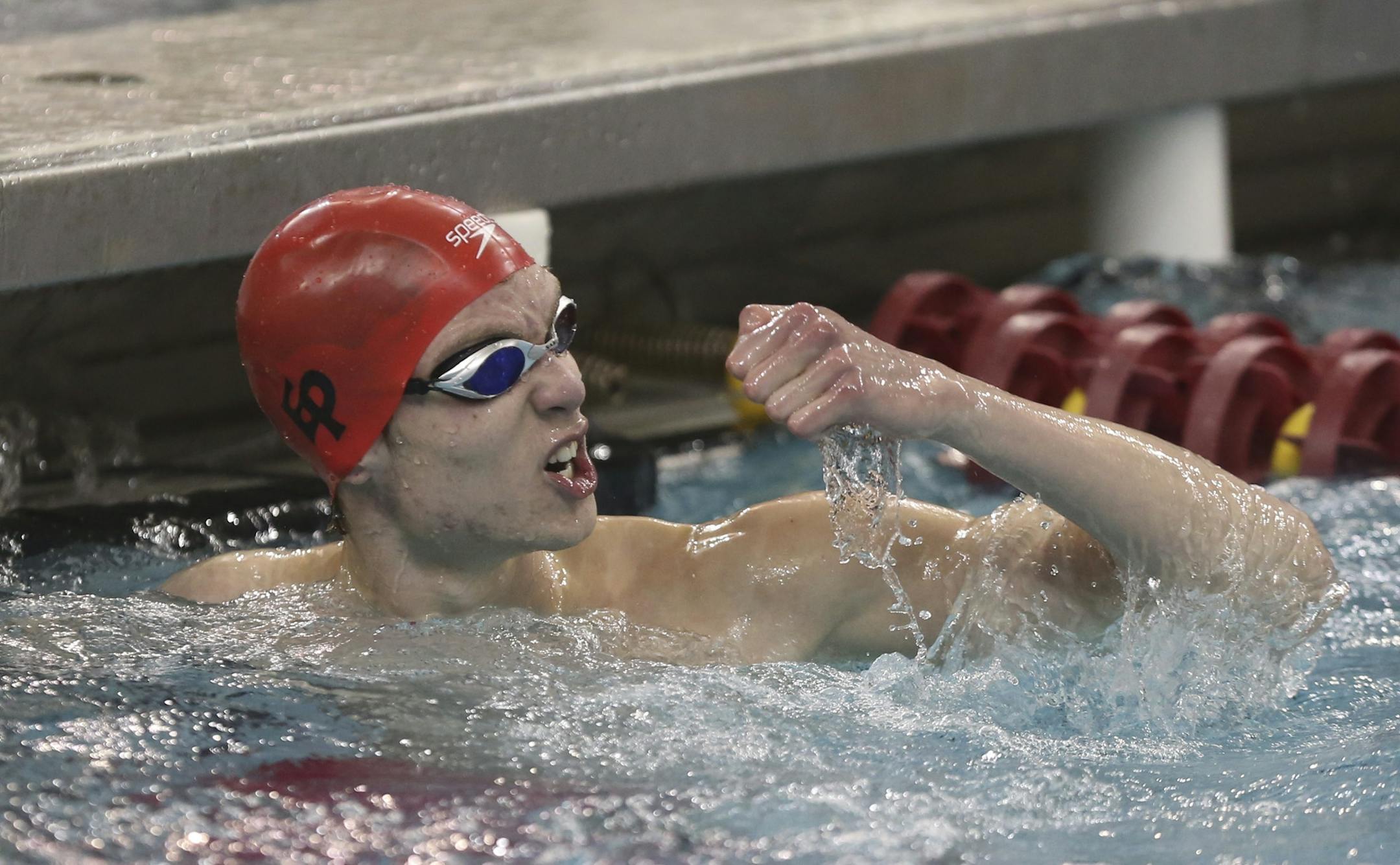 Aaron Greenberg, of Eden Prairie, celebrated after winning first place in the 50 yard freestyle during the Class 2A finals of the boys' swimming and diving meet.