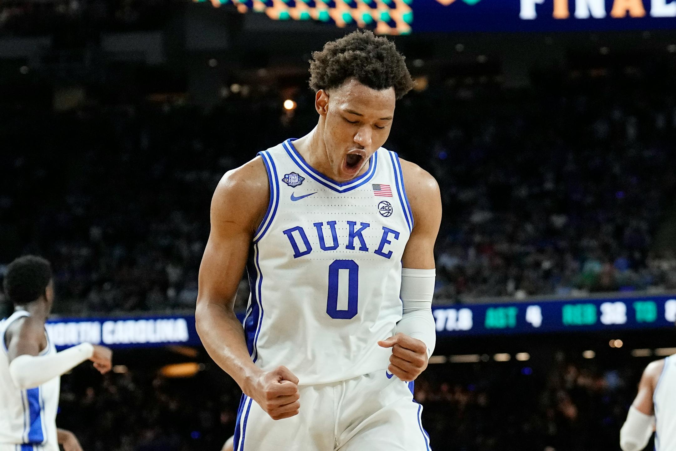 Duke forward Wendell Moore Jr. celebrates after scoring against North Carolina during the second half of a college basketball game in the semifinal round of the Men's Final Four NCAA tournament, Saturday, April 2, 2022, in New Orleans. (AP Photo/Brynn Anderson)
