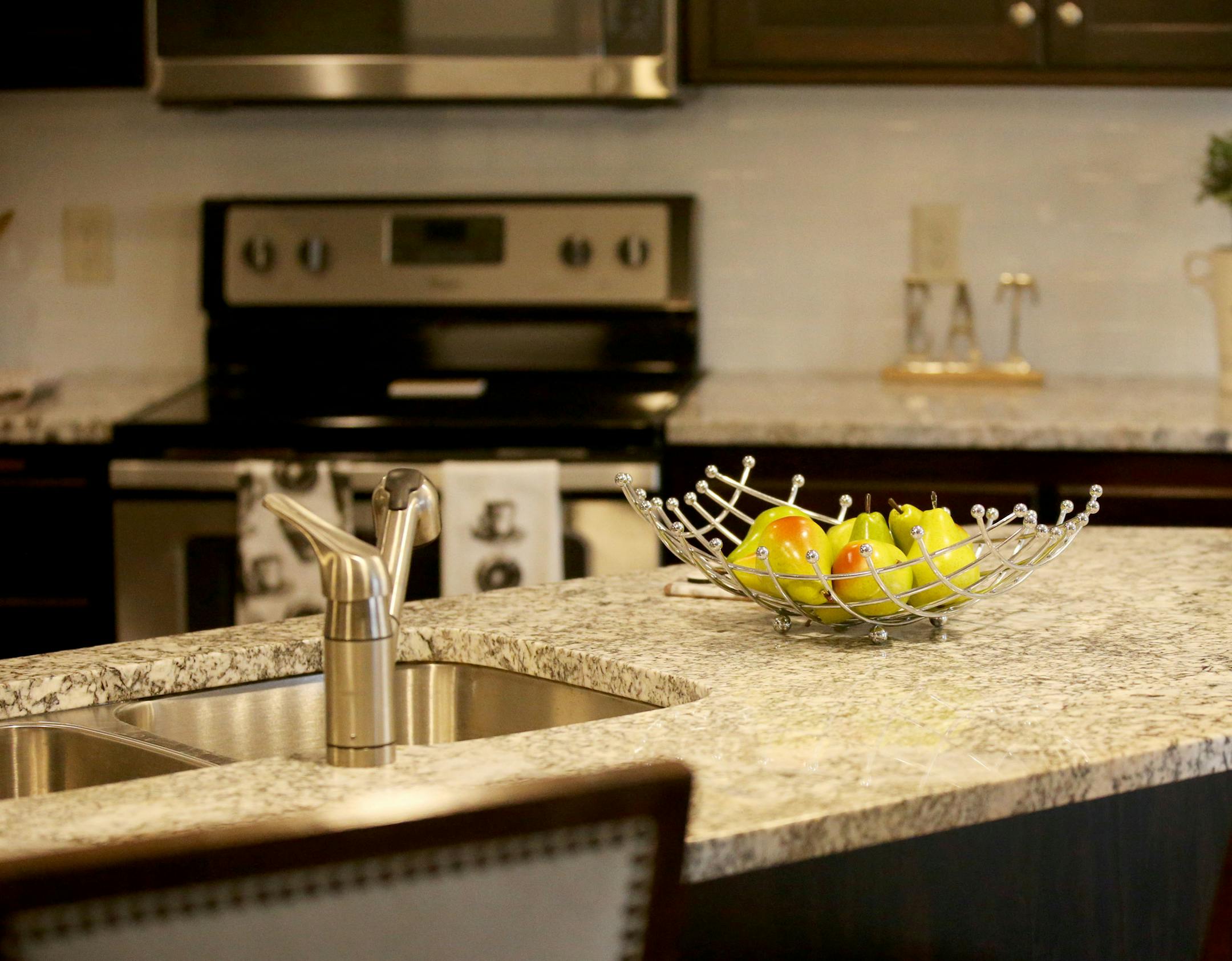 The granite countertop in a 2,100 square foot, three bedroom, three bath, side by side model townhome Wednesday, Nov. 28, 2018, in Mounds View, MN.] DAVID JOLES ï david.joles@startribune.com Home building in the Twin Cities is in the midst of a seasonal slowdown, but sales of entry level new houses have been robust. Buildable lots that are affordable to entry level buyers, however, are in short supply.**Brooke Boss,cq