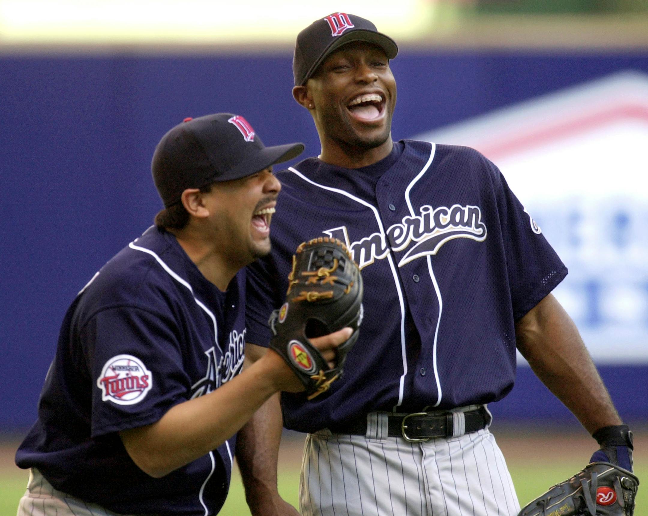 As All-Stars in 2002, Eddie Guardado, left, and Torii Hunter had their share of fun on a division-winning Twins team. Now that personality is back with the return of Hunter, as a player, and Guardado, as a coach.