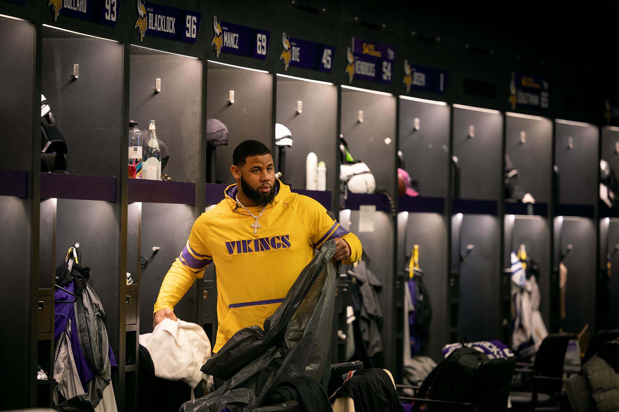 Minnesota Vikings defensive tackle Ross Blacklock (96) cleans out his locker at the TCO Performance Center.