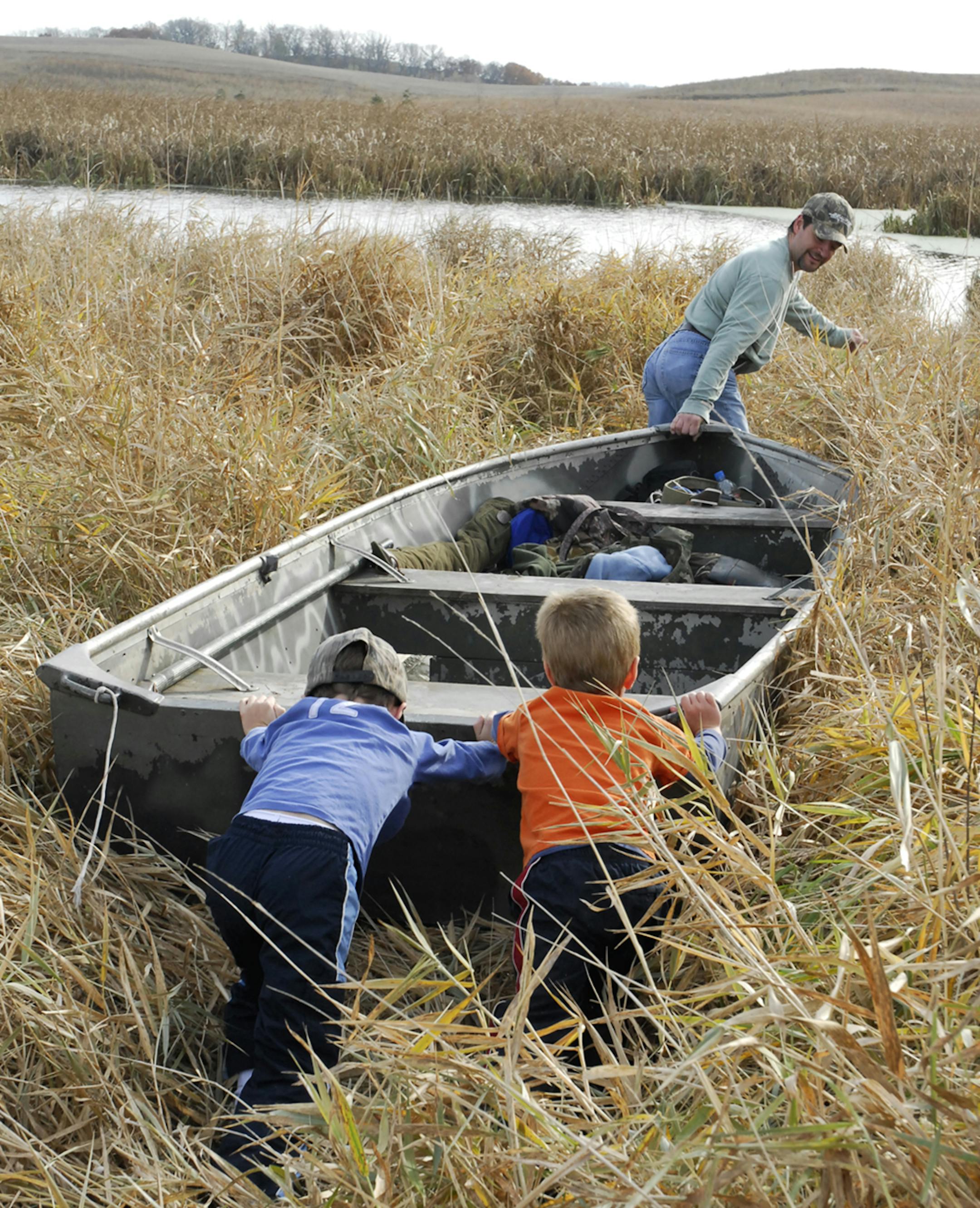 cole and parker pushing duck boat
Jim Williams credit