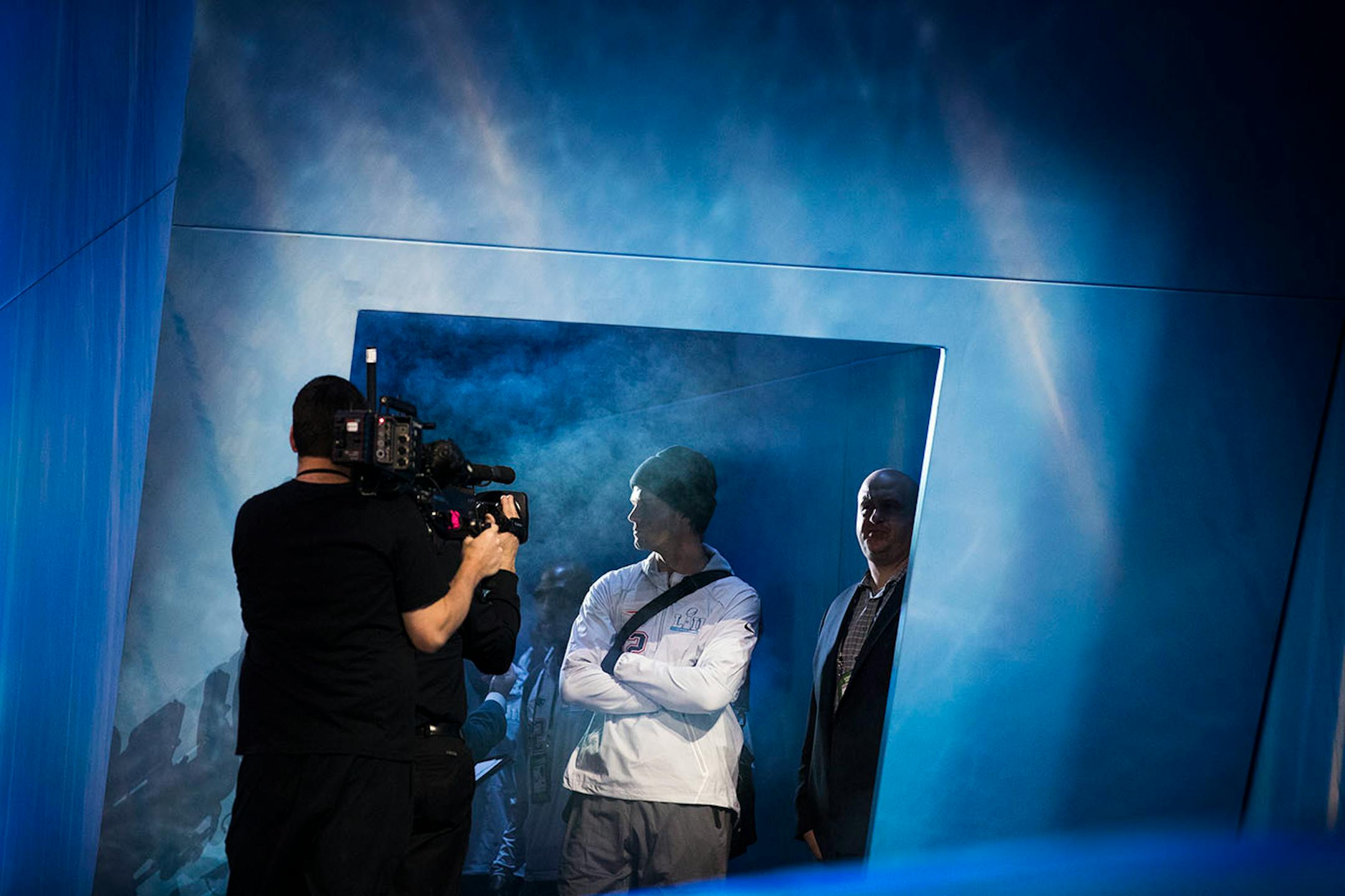 Tom Brady waits to walk out on stage for the introduction of the New England Patriots.