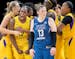 Chelsea Gray (12) celebrated with teammates after making a buzzer beating game winning shot. The LA Sparks beat the Minnesota Lynx 77-76.