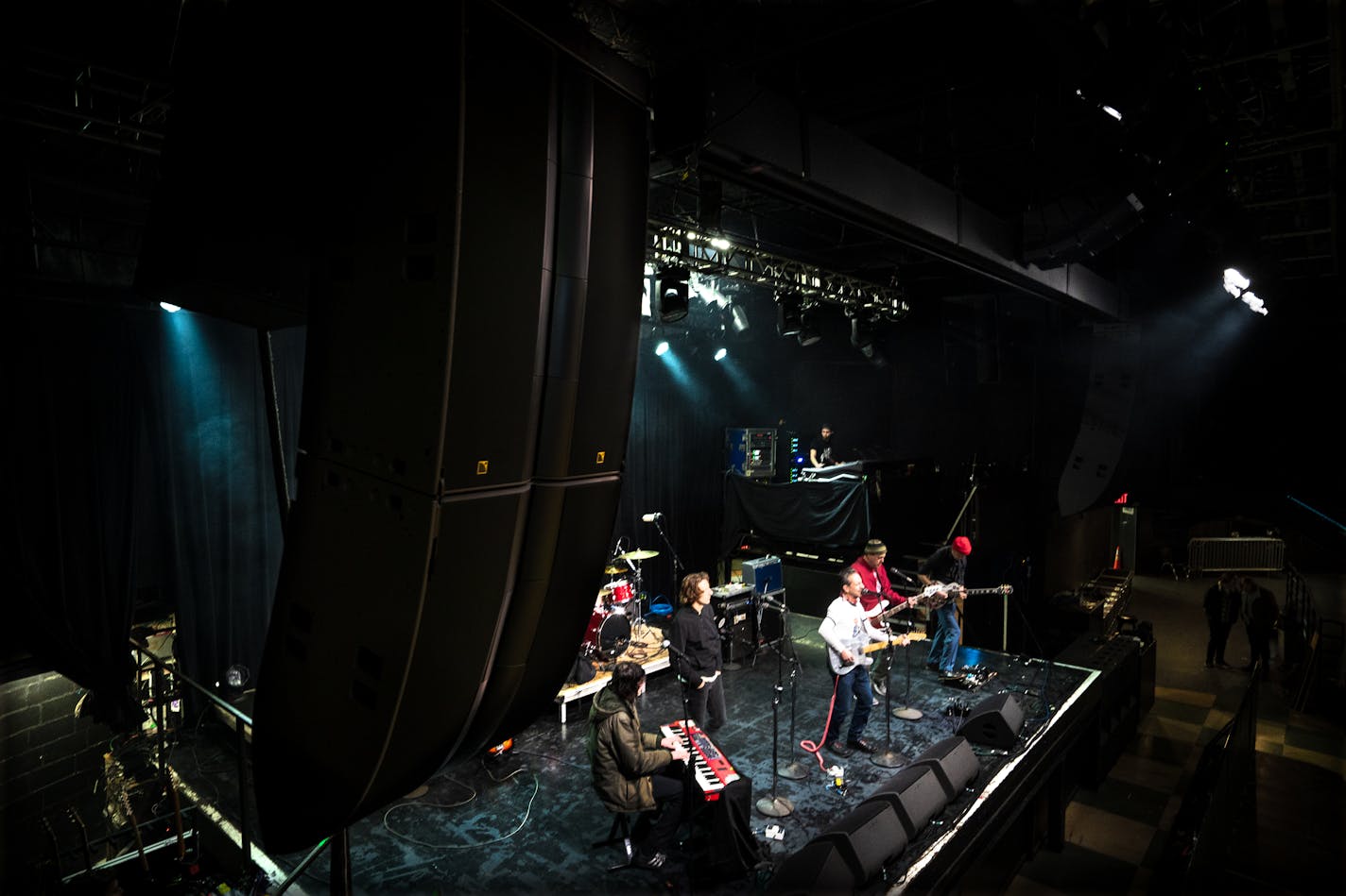 Some of First Avenue's brand new speakers hang from the ceiling during the Ike Reilly Assassination's sound check before their annual Thanksgiving Eve show in Minneapolis, Minn. on Wednesday, Nov. 22, 2023. This is the venue's first sound system overhaul in over a decade and Reilly's band will be the first to perform with them. ] Angelina Katsanis • angelina.katsanis@startribune.com