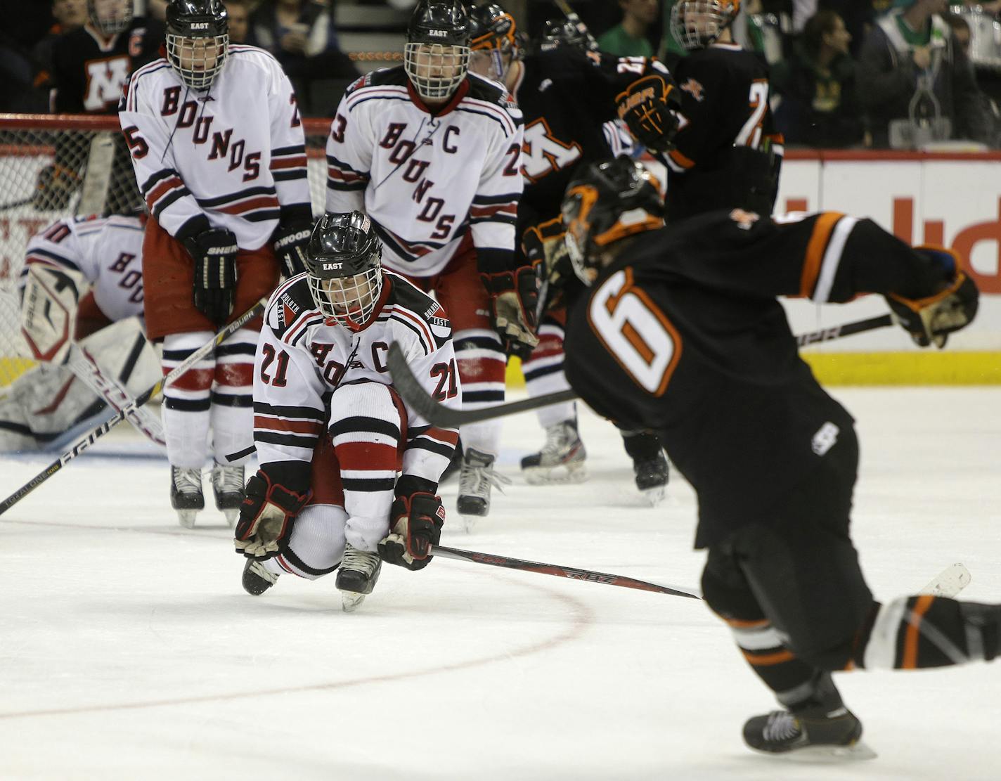 Moorhead's Alex Mehnert made one last effort despite Duluth East's defense during third period during the Class 2A boys' hockey state tournament quarterfinals at the Xcel Energy Center, Thursday, March 7, 2013 in St. Paul, MN.(ELIZABETH FLORES/STAR TRIBUNE) ELIZABETH FLORES &#x2022; eflores@startribune.com