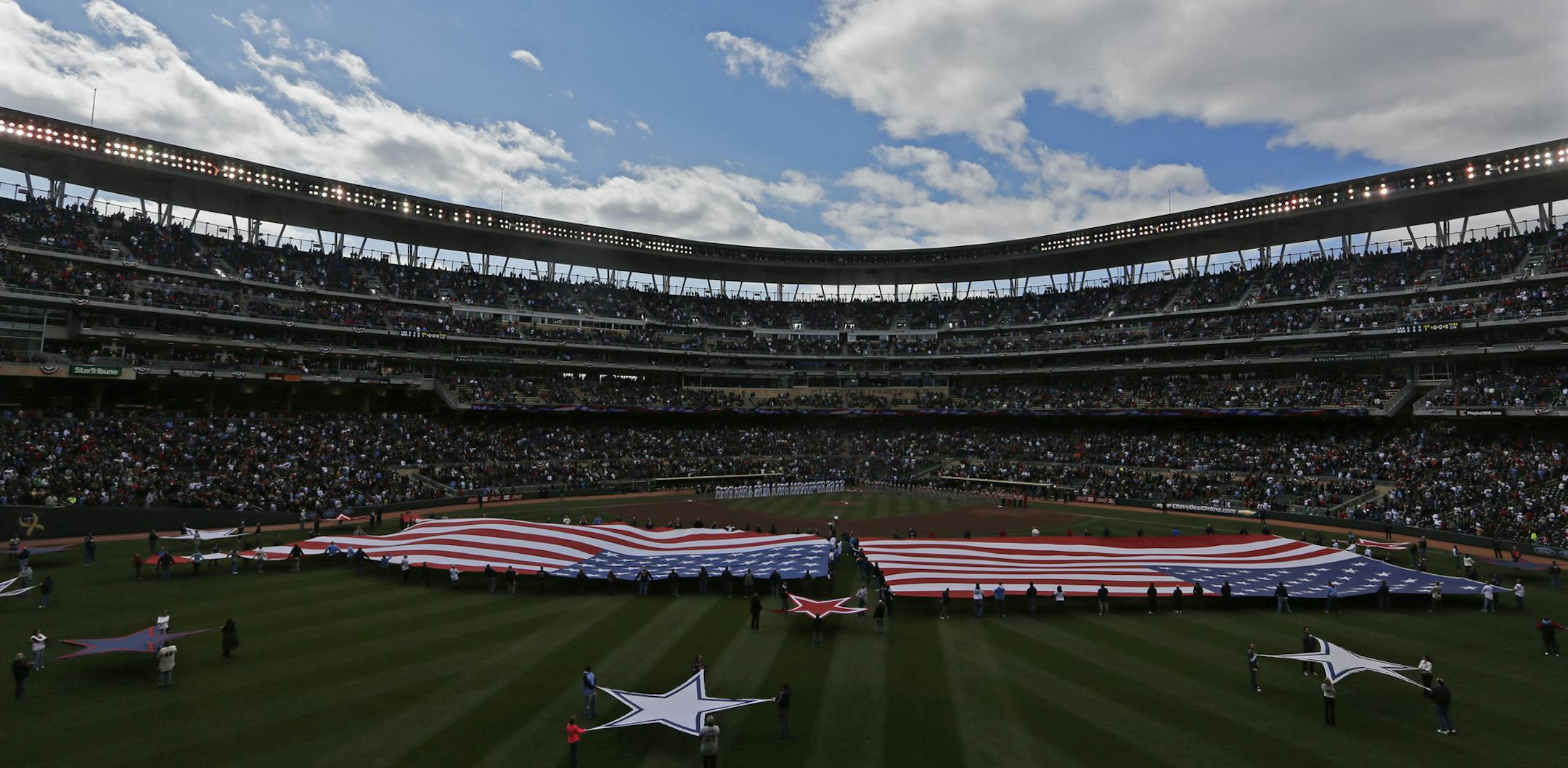 At Target Field, a B-52 Bomber flew over during opening game ceremonies. Temperatures were chilly for opening day, hovering in the 40 degrees range.]richard.tsong-taatarii@startribune.com,