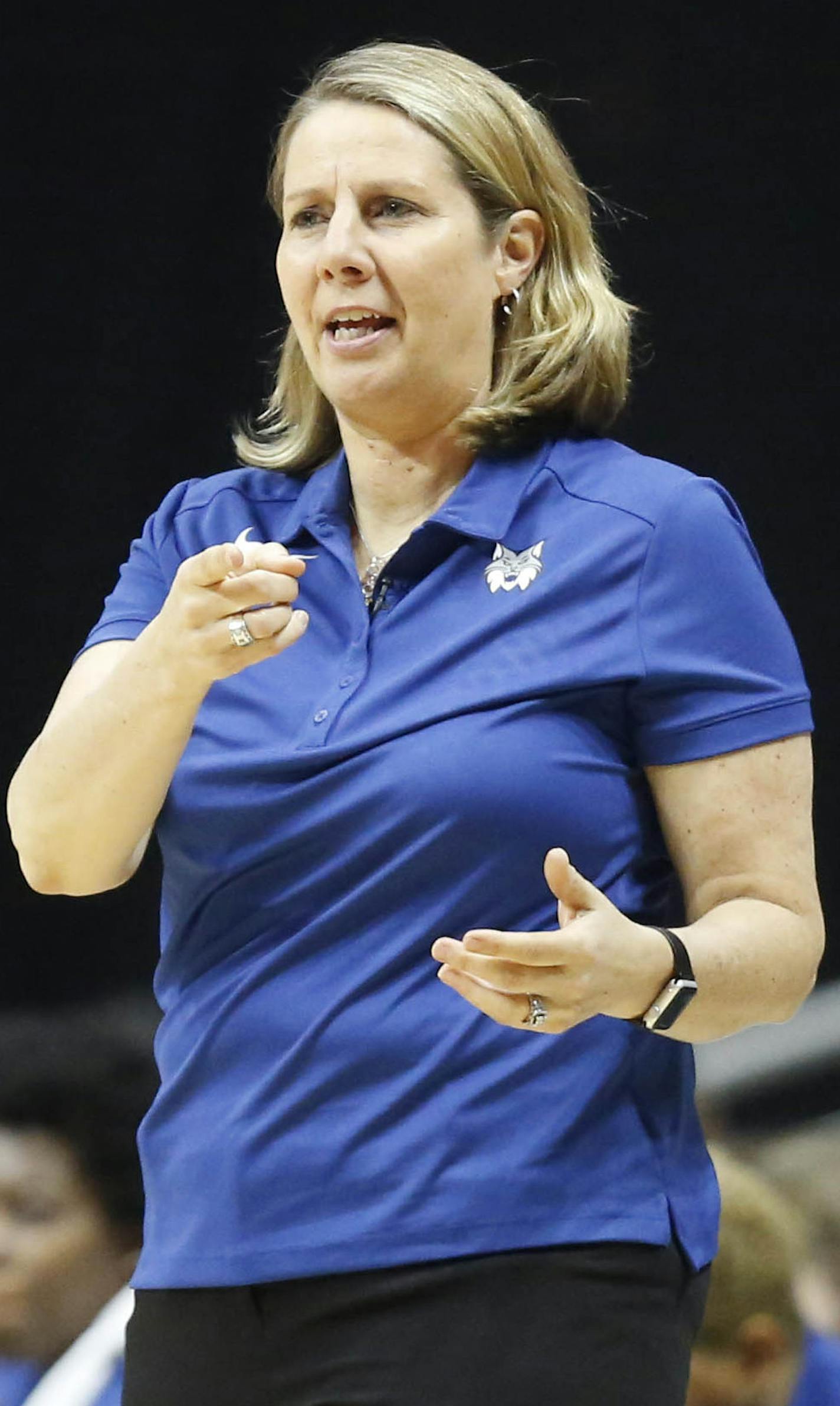 Lynx head coach Cheryl Reeve talks with Lynx center Vionise Pierre-Louis (22) Sunday, May 6, 2018, during their WNBA preseason game against the Mystics at Wells Fargo Arena in Des Moines, Iowa.