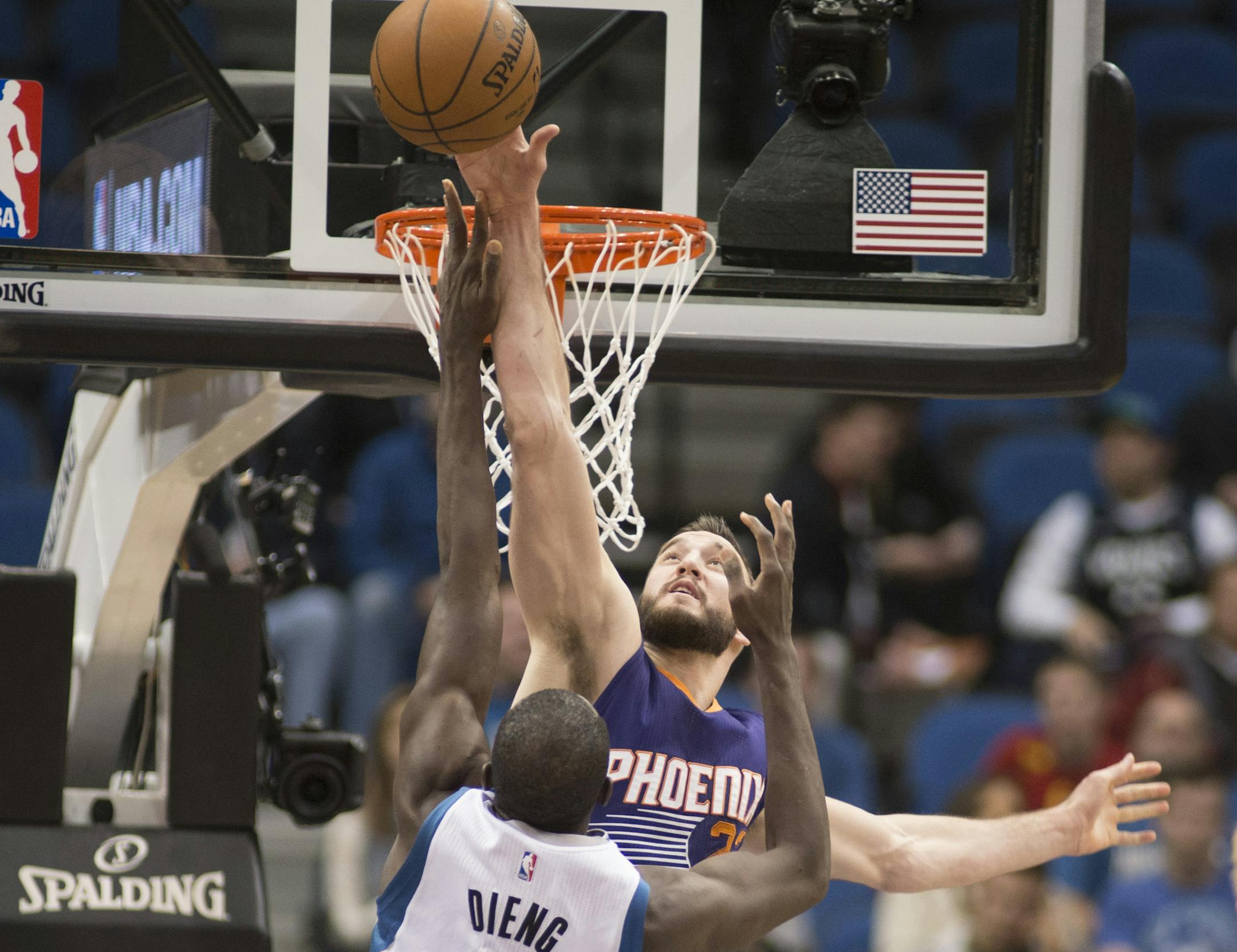 Phoenix Suns center Miles Plumlee (22) blocks a shot by Minnesota Timberwolves center Gorgui Dieng (5) during the second quarter. ] (Aaron Lavinsky | StarTribune) The Minnesota Timberwolves play the Phoenix Suns Wednesday, Jan. 7, 2014 at Target Center in Minneapolis.