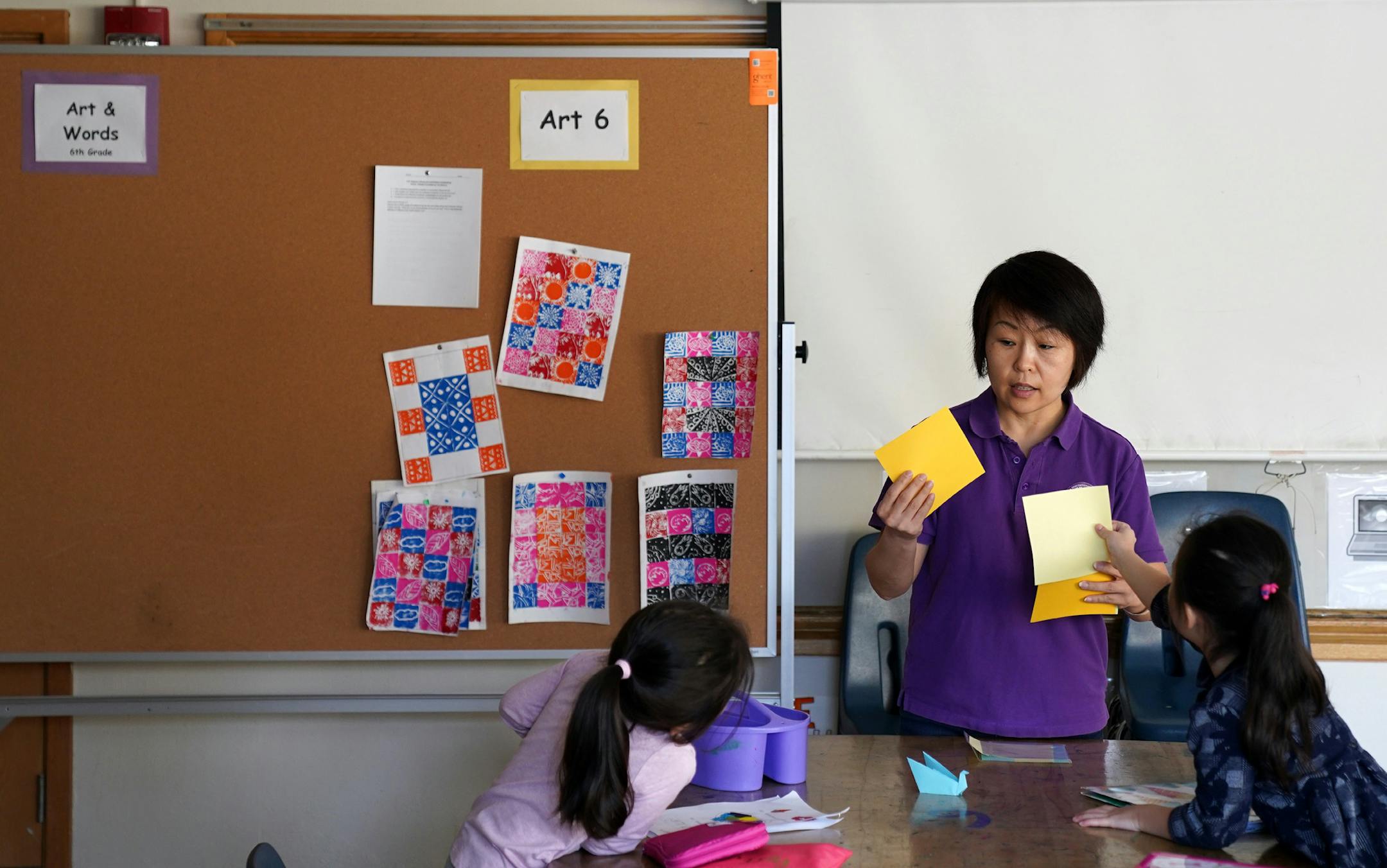 Preschool teacher Qiuyu Zhang worked with her students during class Saturday. ] ANTHONY SOUFFLE &#x2022; anthony.souffle@startribune.com Students gathered for classes in Chinese Saturday, March 7, 2020 at South View Middle School in Edina, Minn.