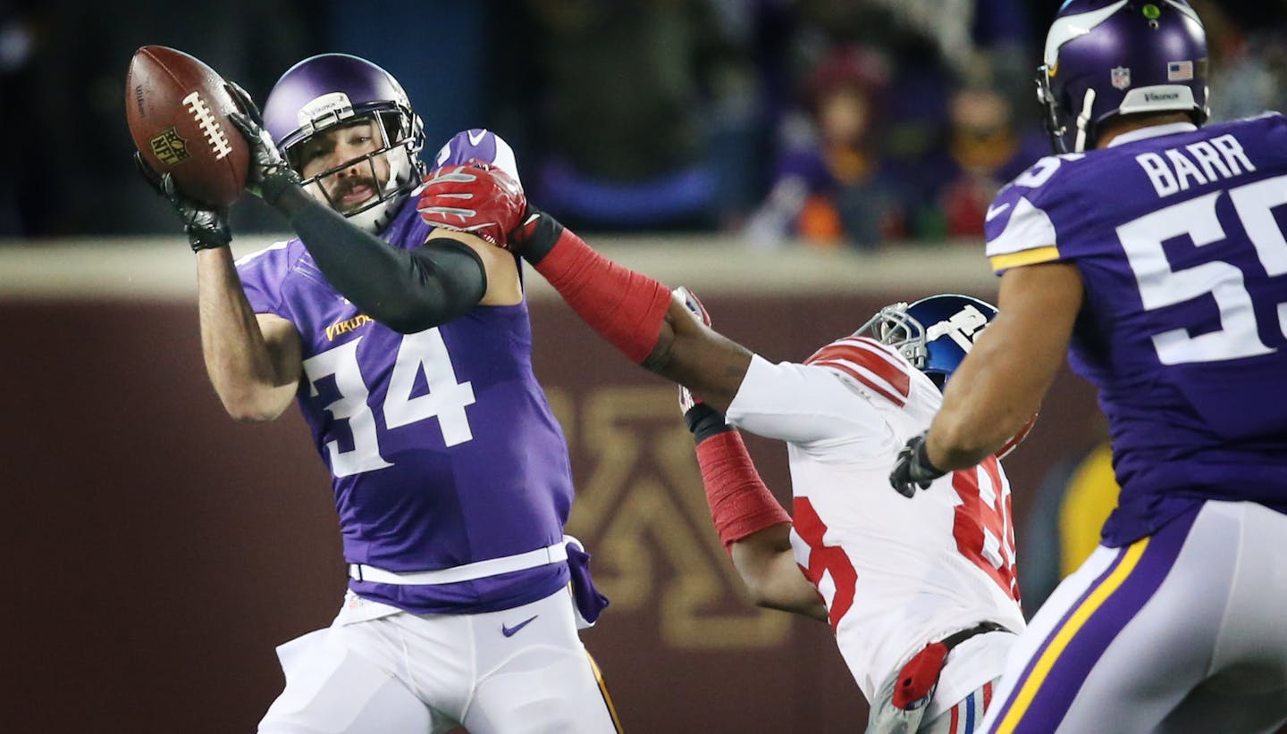 Minnesota Vikings strong safety Andrew Sendejo (34) intercepted a pass intended for New York Giants wide receiver Hakeem Nicks (88) in the first quarter Sunday December 27, 2015 in Minneapolis, MN.