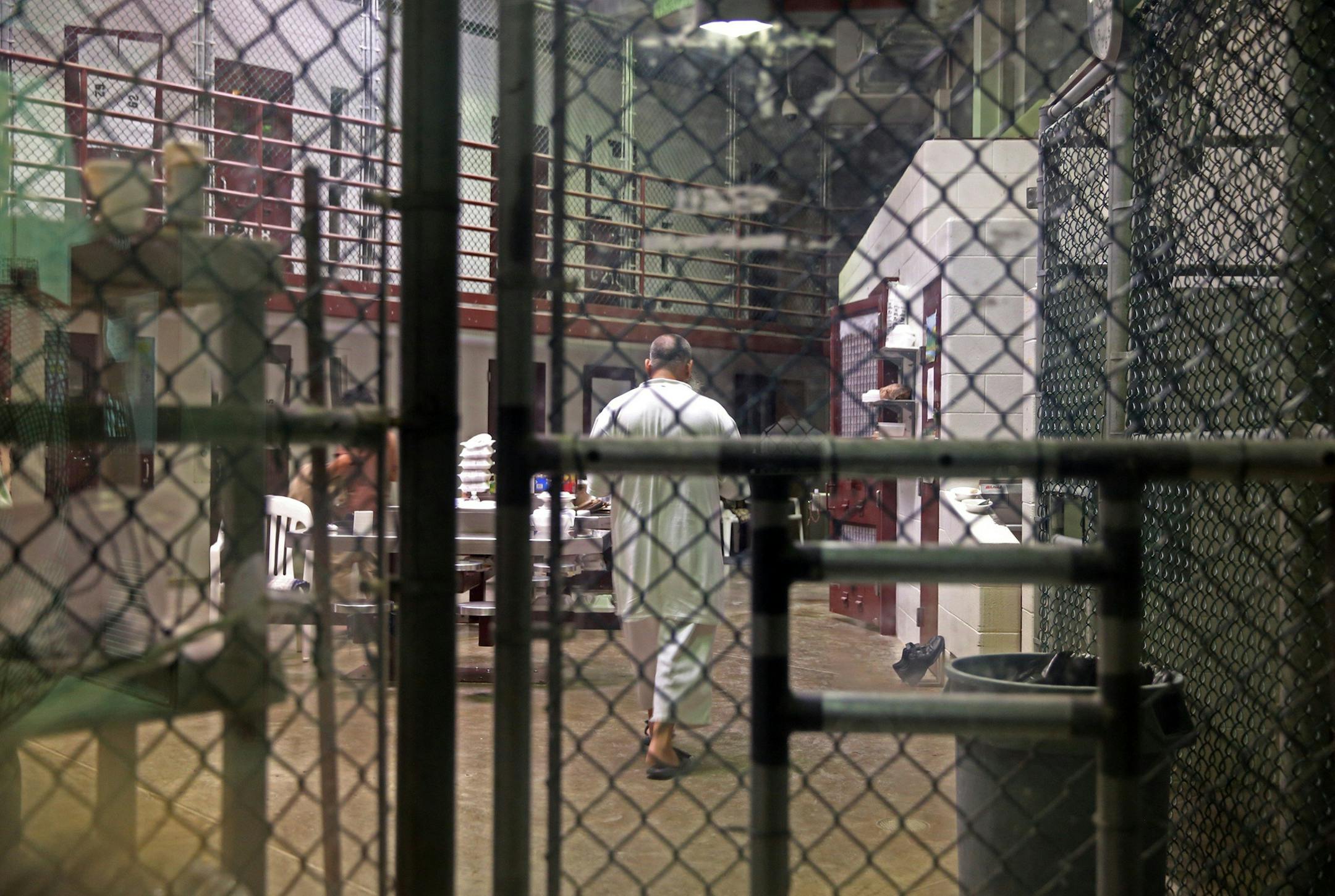 A cooperative captive is seen through one-way glass inside a communal cellblock at Camp 6, at the U.S. Navy base at Guantanamo Bay, Cuba, on Feb. 9, 2016 in this photo approved for release by the U.S. military. (Walter Michot/Miami Herald/TNS)