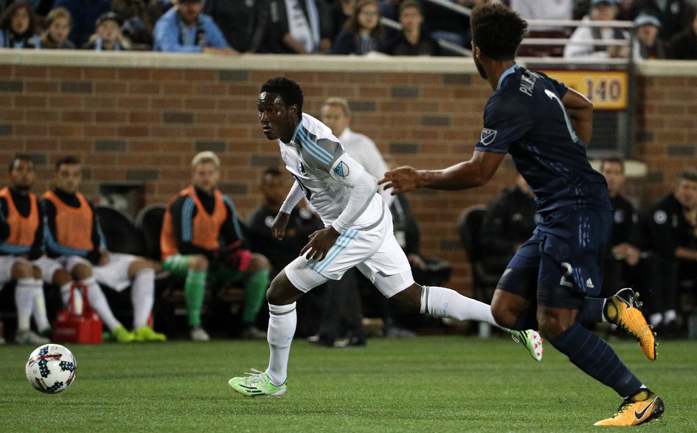 Sporting Kansas City defender Erik Palmer-Brown (2) raced Minnesota United forward Abu Danladi (9) for the ball in the first half. ] ANTHONY SOUFFLE &#xef; anthony.souffle@startribune.com Game action from an MLS match between the Minnesota United and the Sporting Kansas City Saturday, Oct. 7, 2017 at TCF Bank Stadium in Minneapolis.