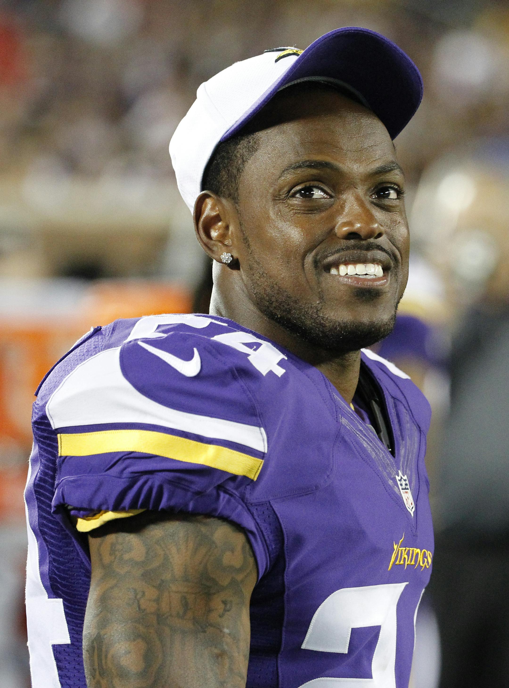 Minnesota Vikings cornerback Captain Munnerlyn (24) watches from the sidelines in the second half of a preseason NFL football game against the Tampa Bay Buccaneers at TCF Bank Stadium Saturday, Aug. 15, 2015, in Minneapolis. (AP Photo/Ann Heisenfelt) ORG XMIT: MIN2015082921223156