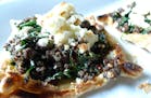 The rustic beef pastry is a Moroccan-spiced, grass-fed beef and baby spinach topped with creamy goat cheese and nestled in a flakey butter crust at Fr