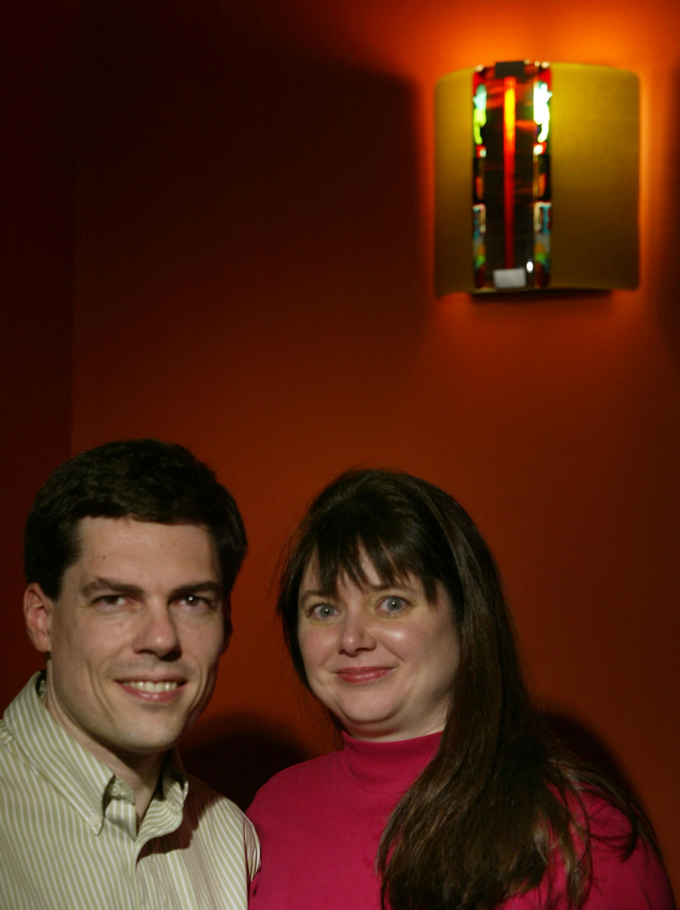 Bill Humphrey and Heidi Hardner incorporated custom art-glass sconces by Minneapolis artist Malcolm Potek when they remodeled their home last year.